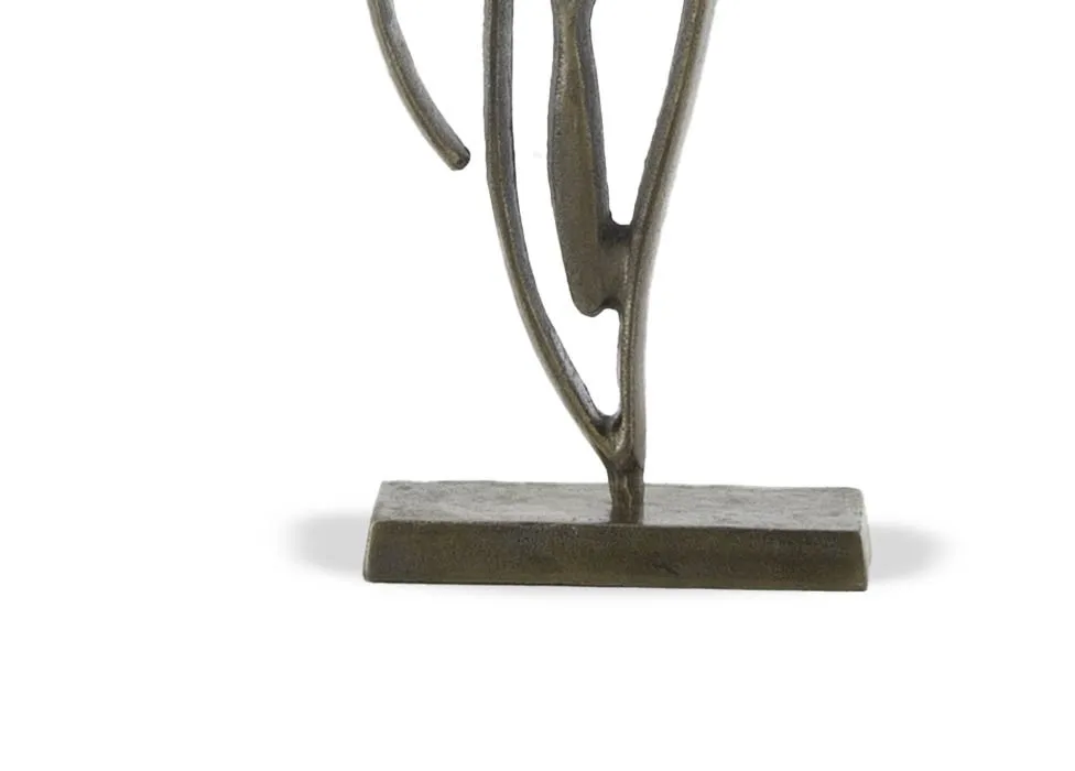 An antique bronze ornament of a tulip outline on a base from EZ Livings Tulipanu range. Closeup of base