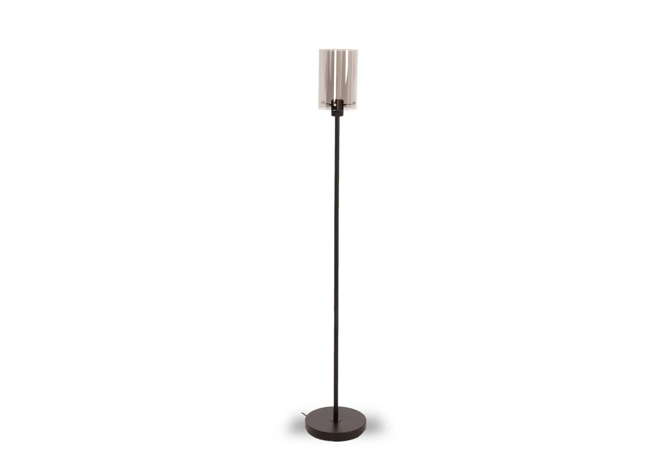 A lifestyle image of the Leanne smoked glass floor lamp with the light on paired with Oslo sideboard.
