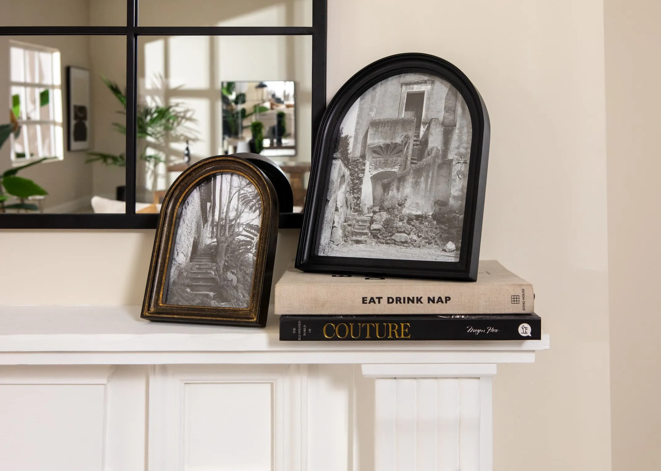 A lifestyle image of the Letta Frames on a mantle with 2 books.