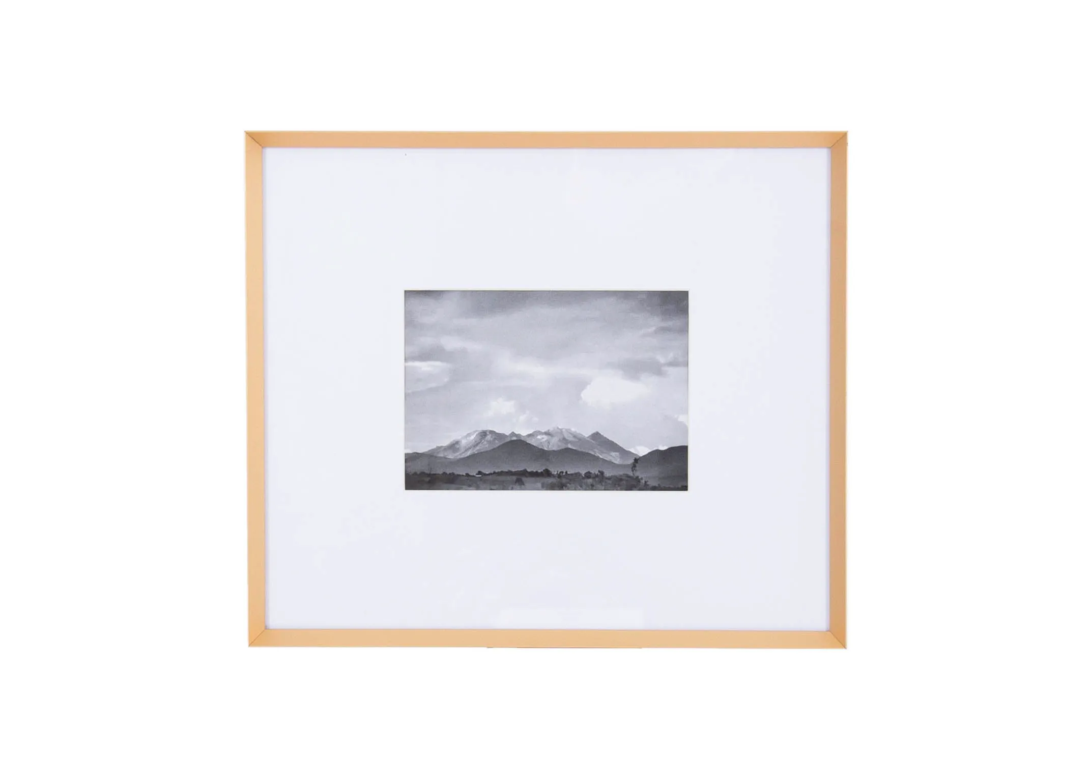 A small brass photo frame with wide white inlay from EZ Livings Arabel range. Front view