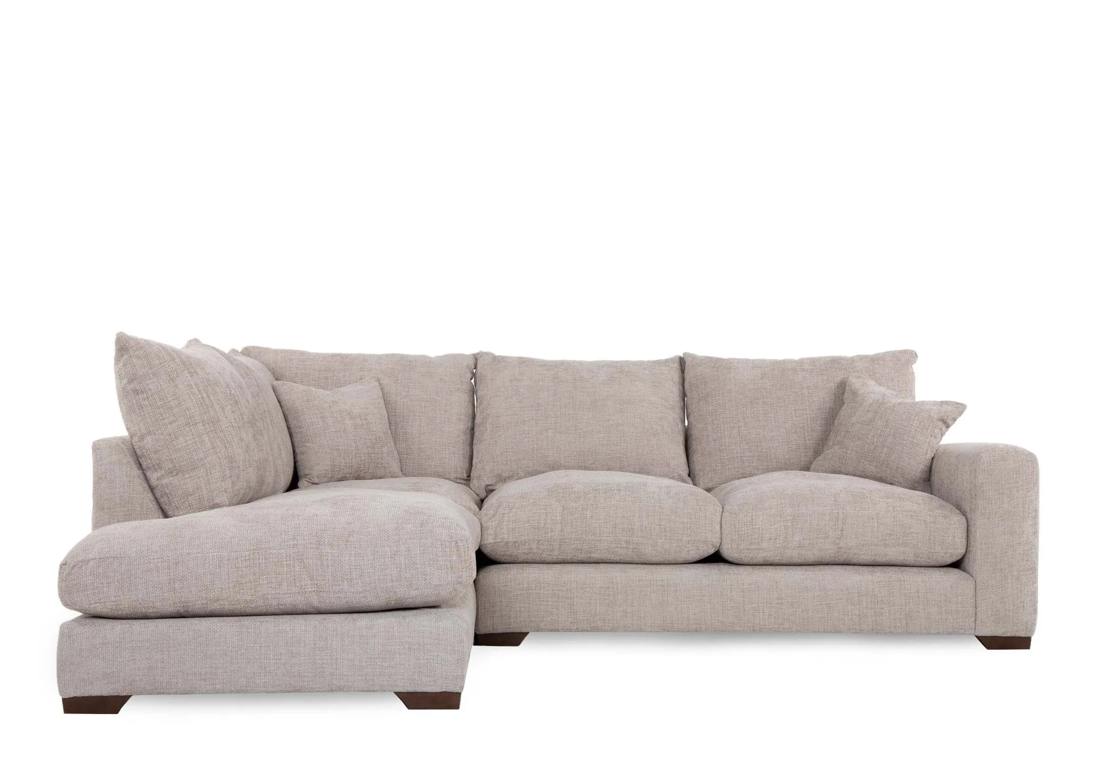A beige fabric corner sofa with lhf lounger from EZ Livings Aurora range. Front view of plump cushions