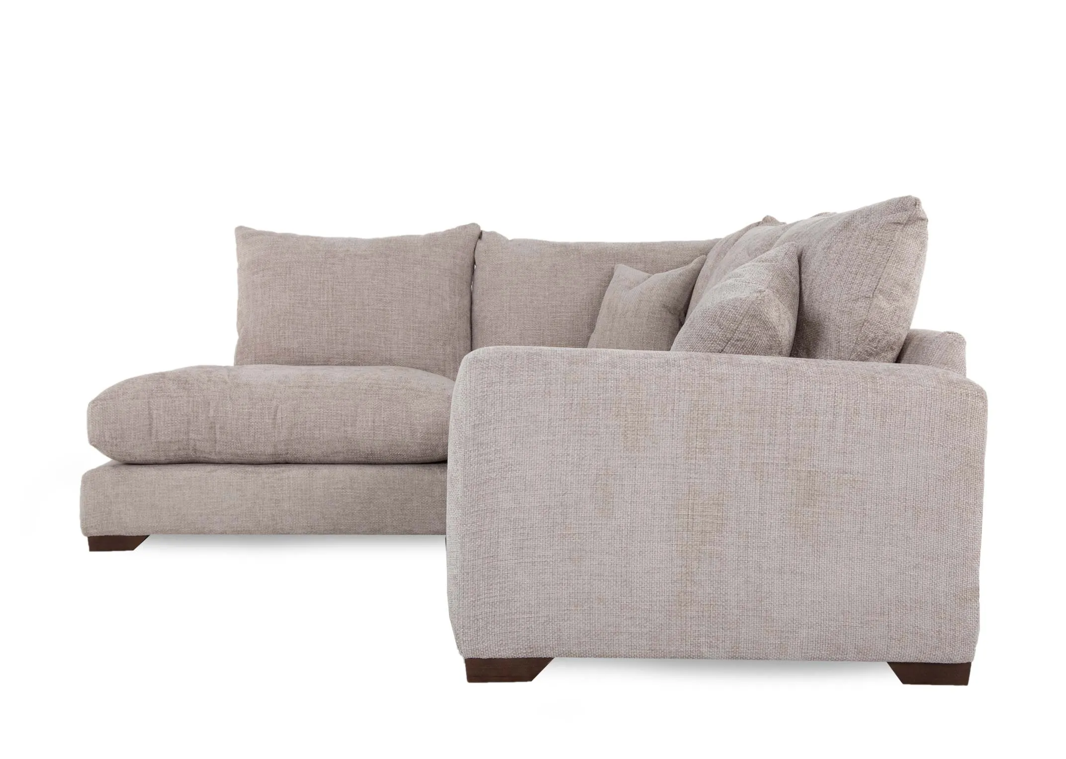 A beige fabric corner sofa with lhf lounger from EZ Livings Aurora range. Side view of sofa