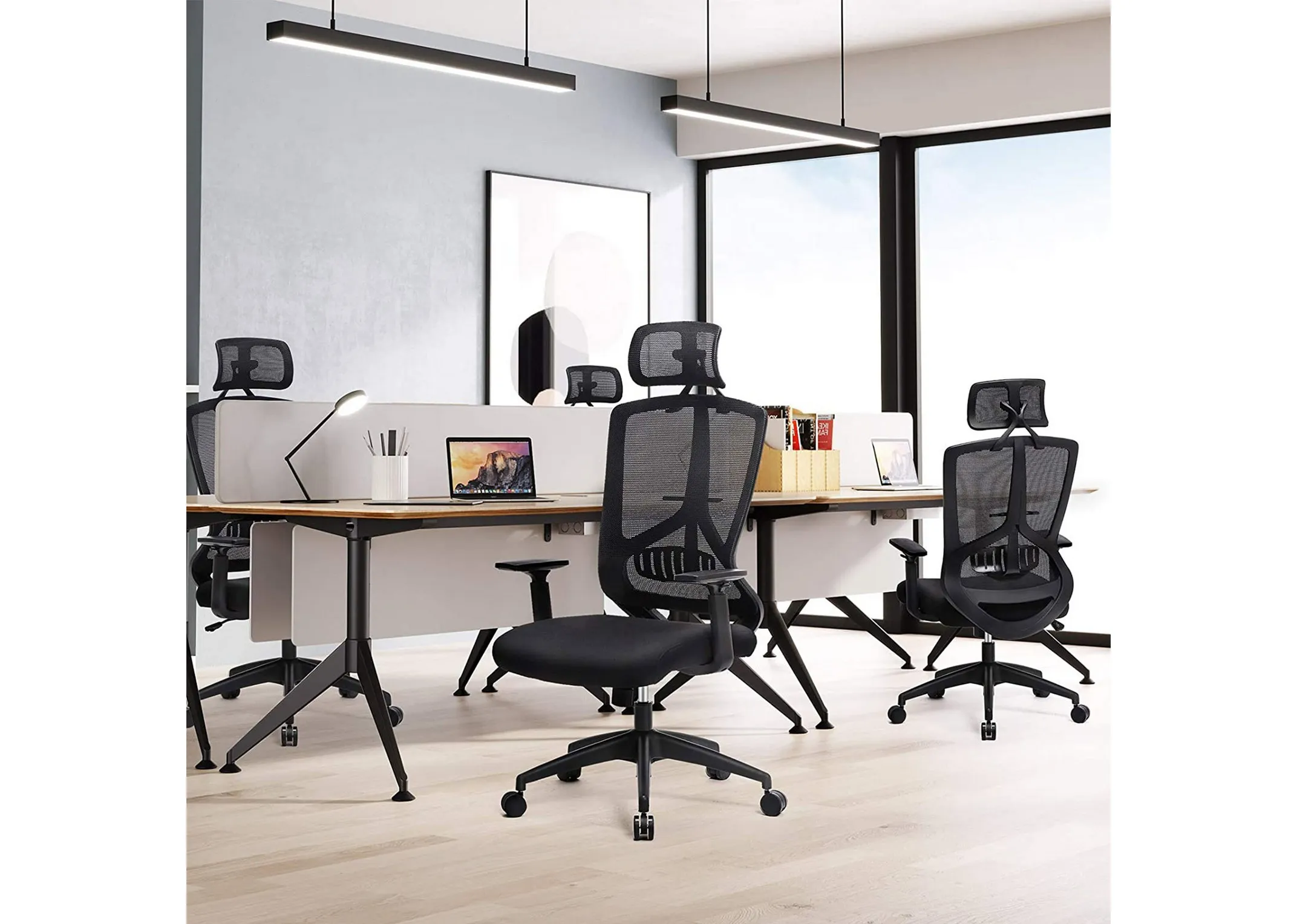 A black office chair from EZ Livings Redford range at a communal desk space