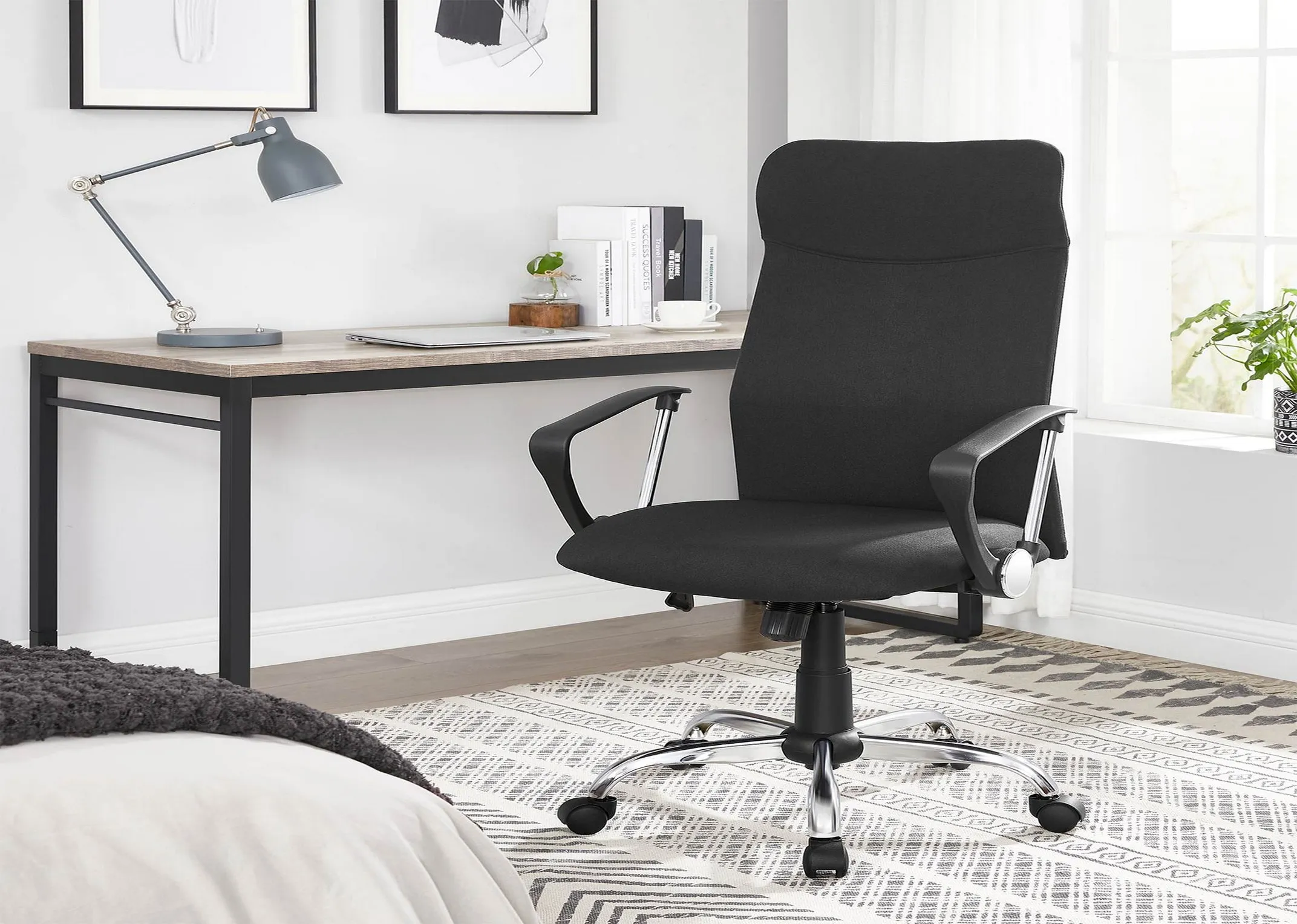 A lifestyle image of the Wells office chair in a home office