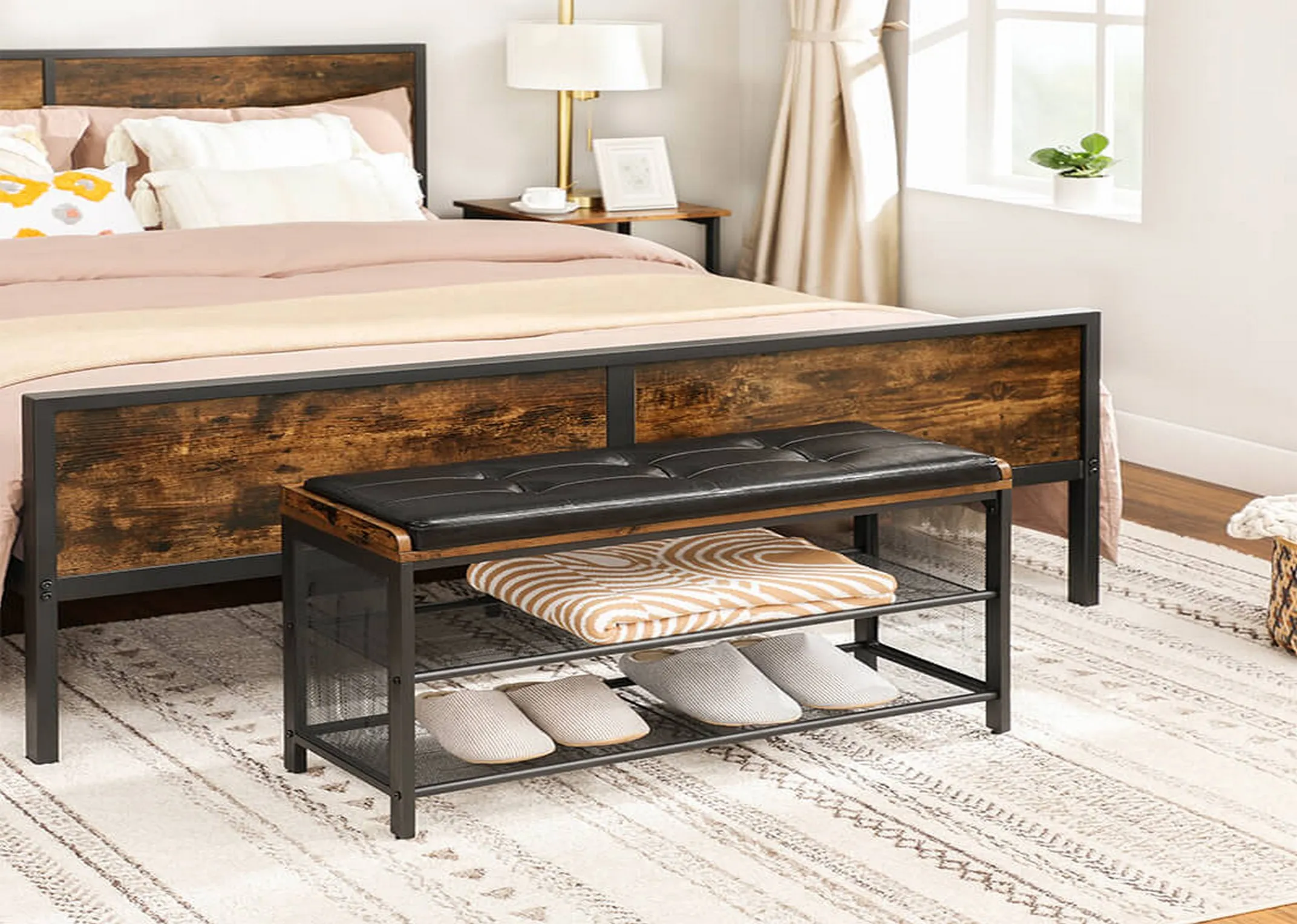 A lifestyle image of the Taos Bench with shoes in a  bedroom setting