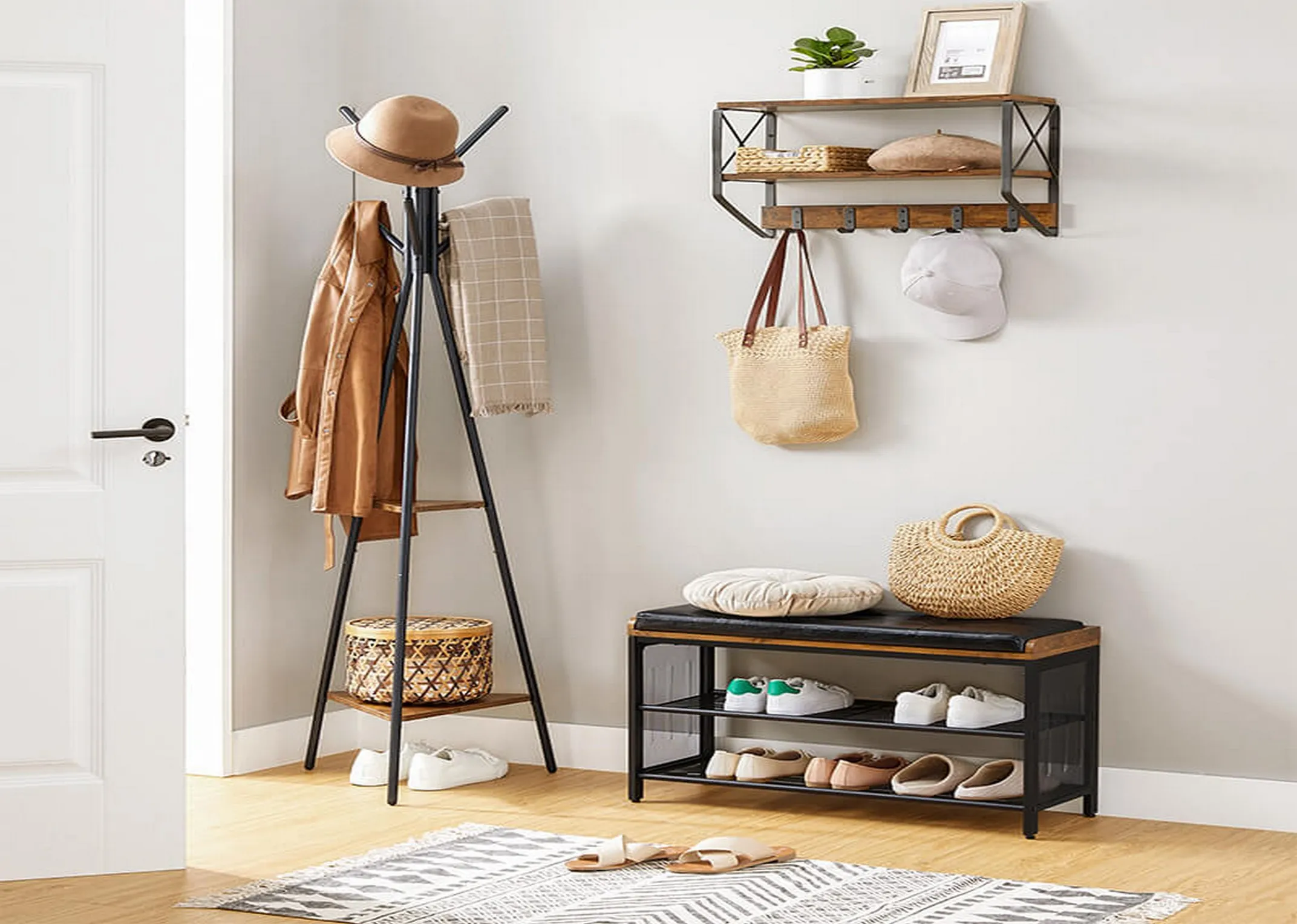 A lifestyle image of the Taos Bench with shoes and handbags ad a coat rack