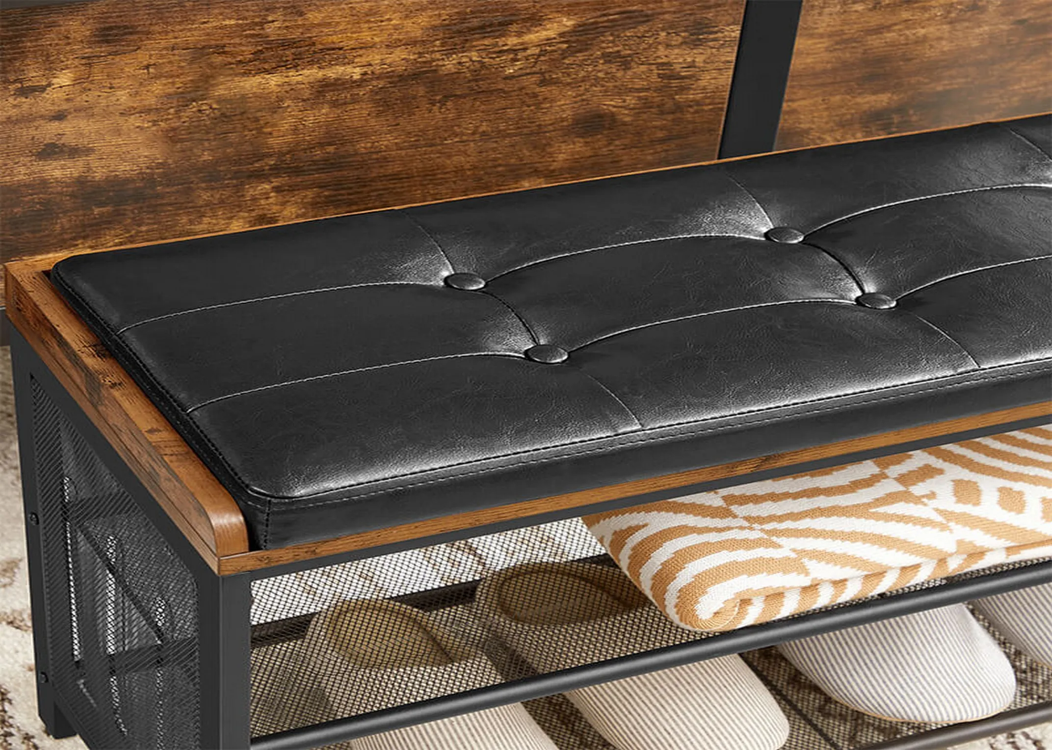 A 2 shelf metal show bench with black faux leather & wood seat from EZ Livings Taos range.