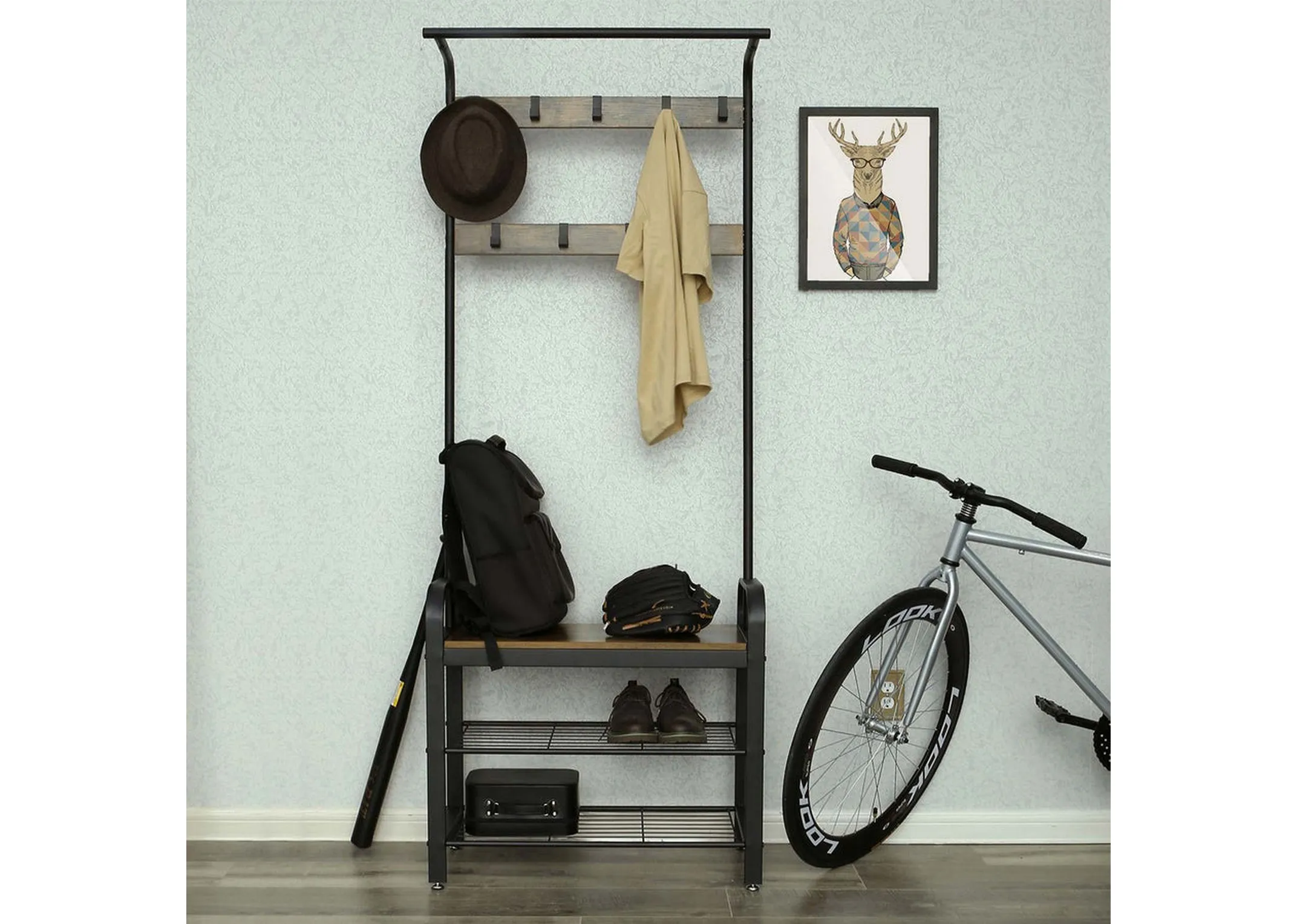 A lifestyle image of the Barrow grey coat rack with shoes