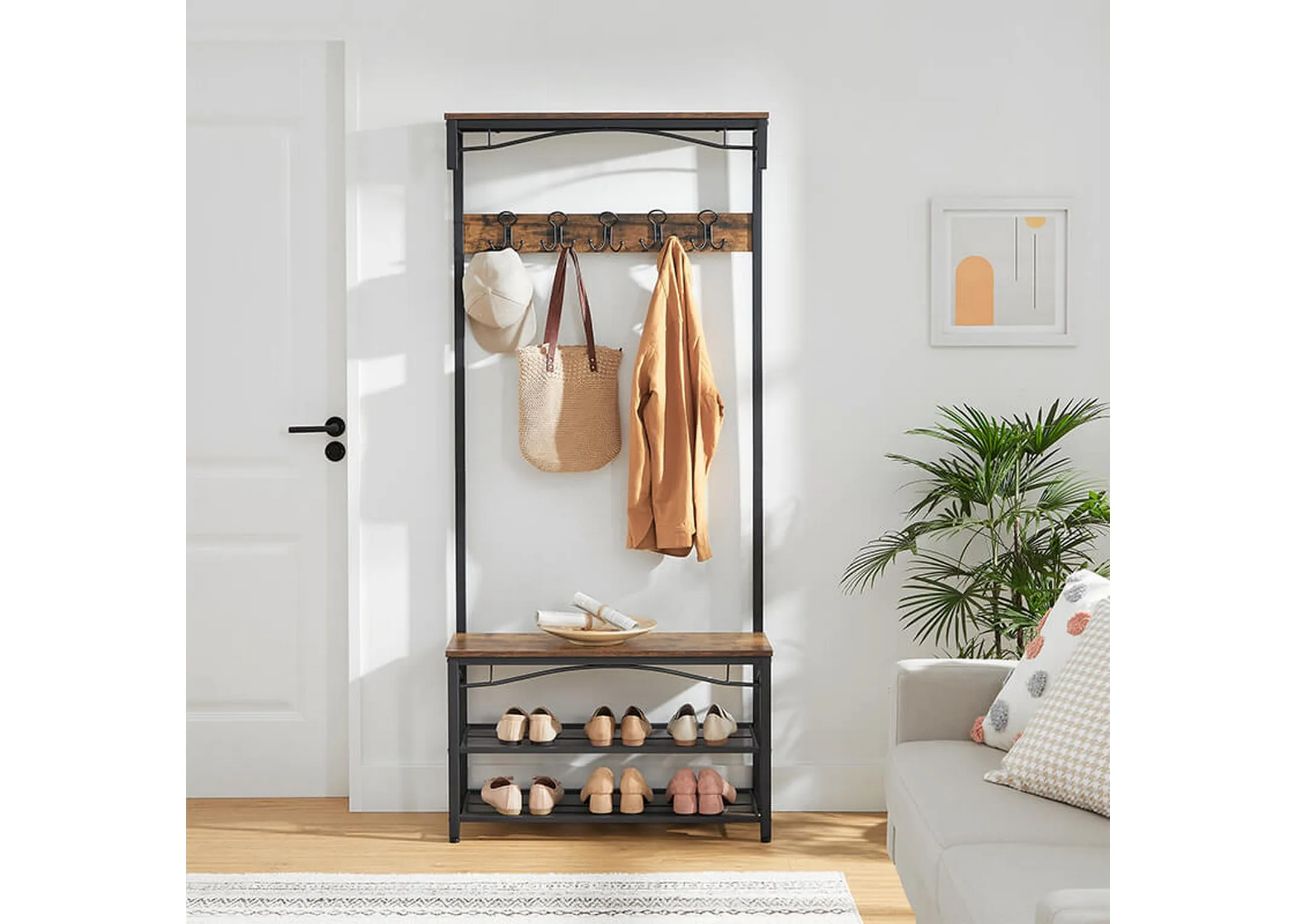 A lifestyle closeup of the Grimm coat stand with bag