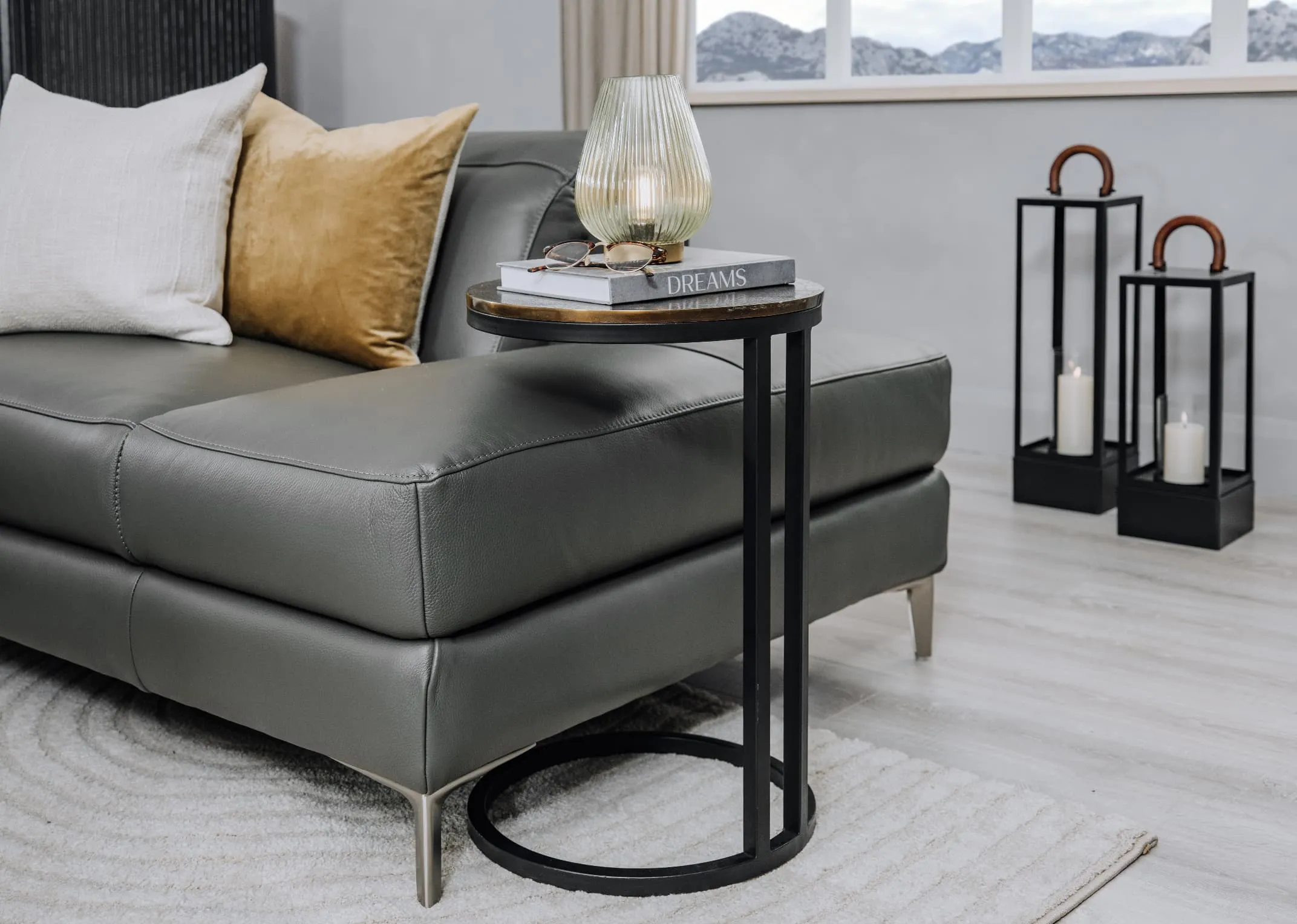 A lifetsyle image of the Toko side table with the Vancouver chaise
