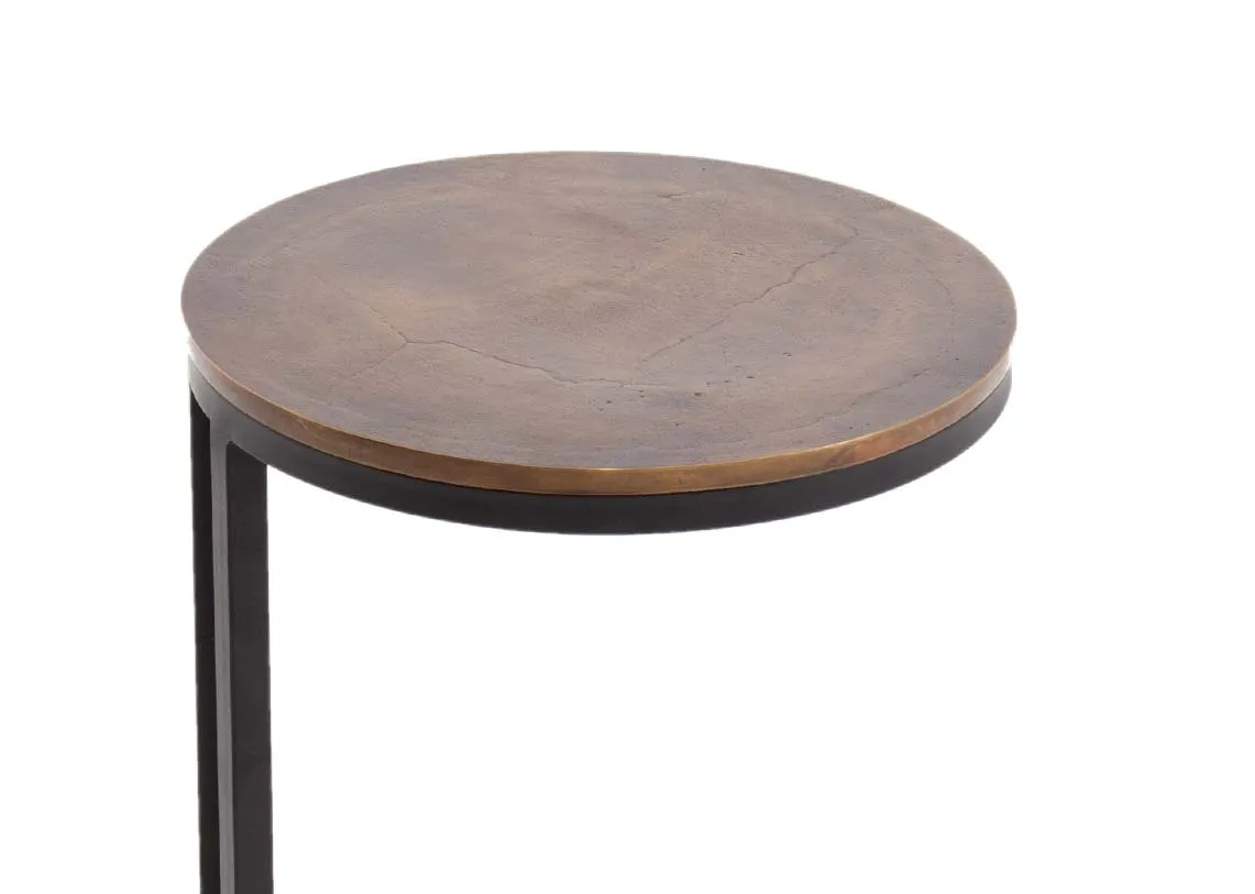 A round bronze metal side table from EZ Livings Toko range. Closeup