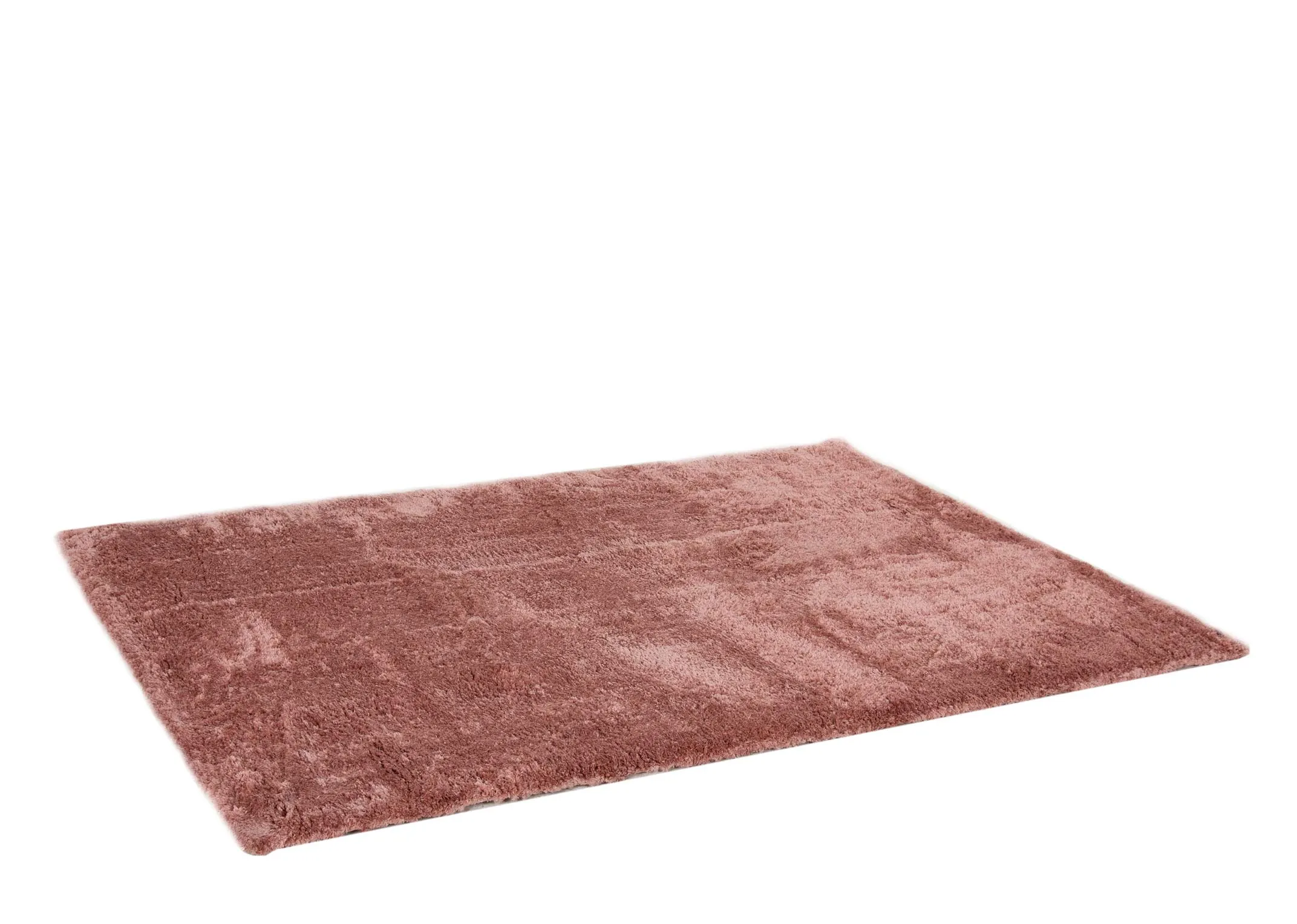 A coral pink deep pile rug from EZ Livings Lux range. Angled view