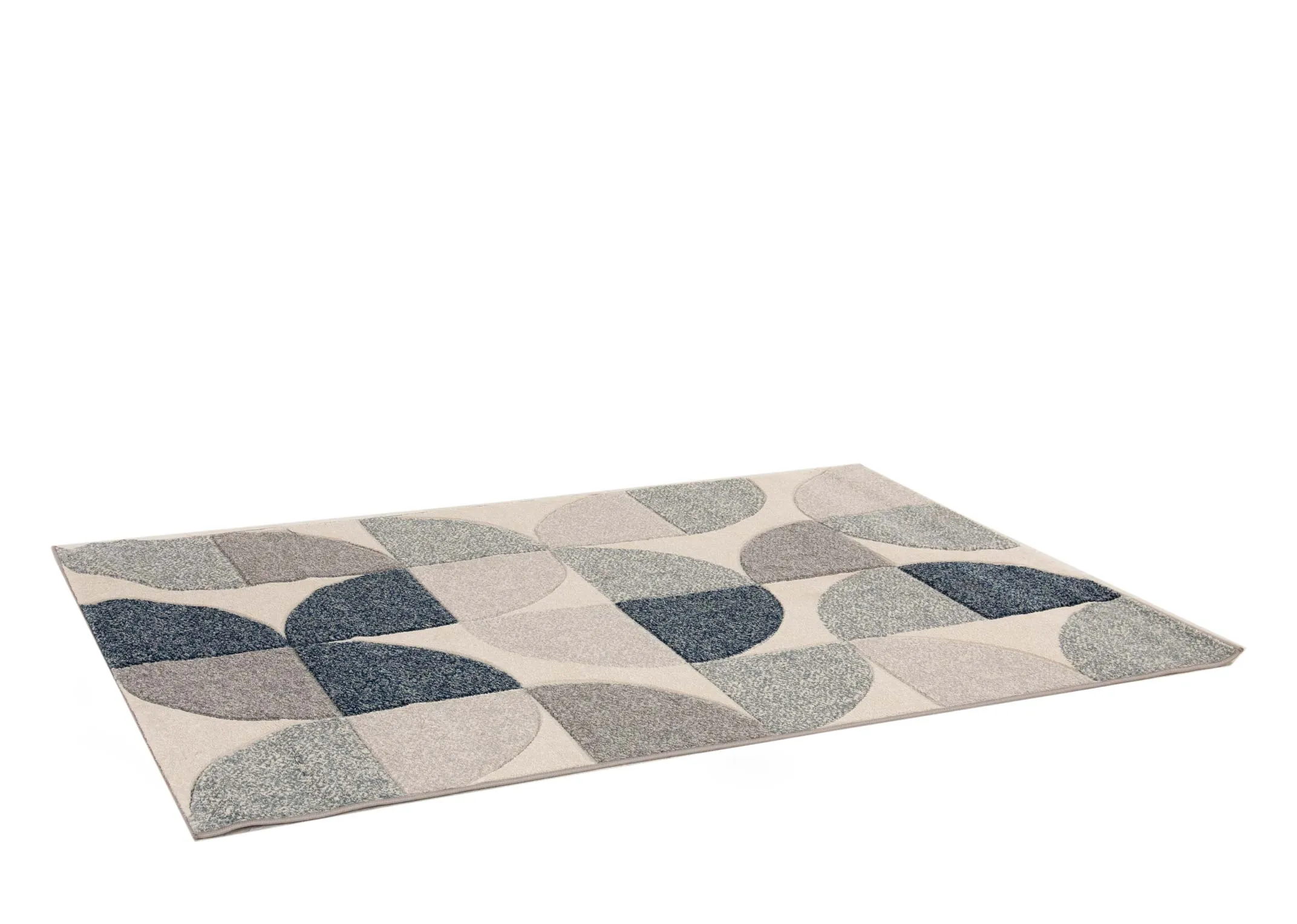 A cream rug with navy and grey quart circle print from EZ Livings Holden range. Angled view