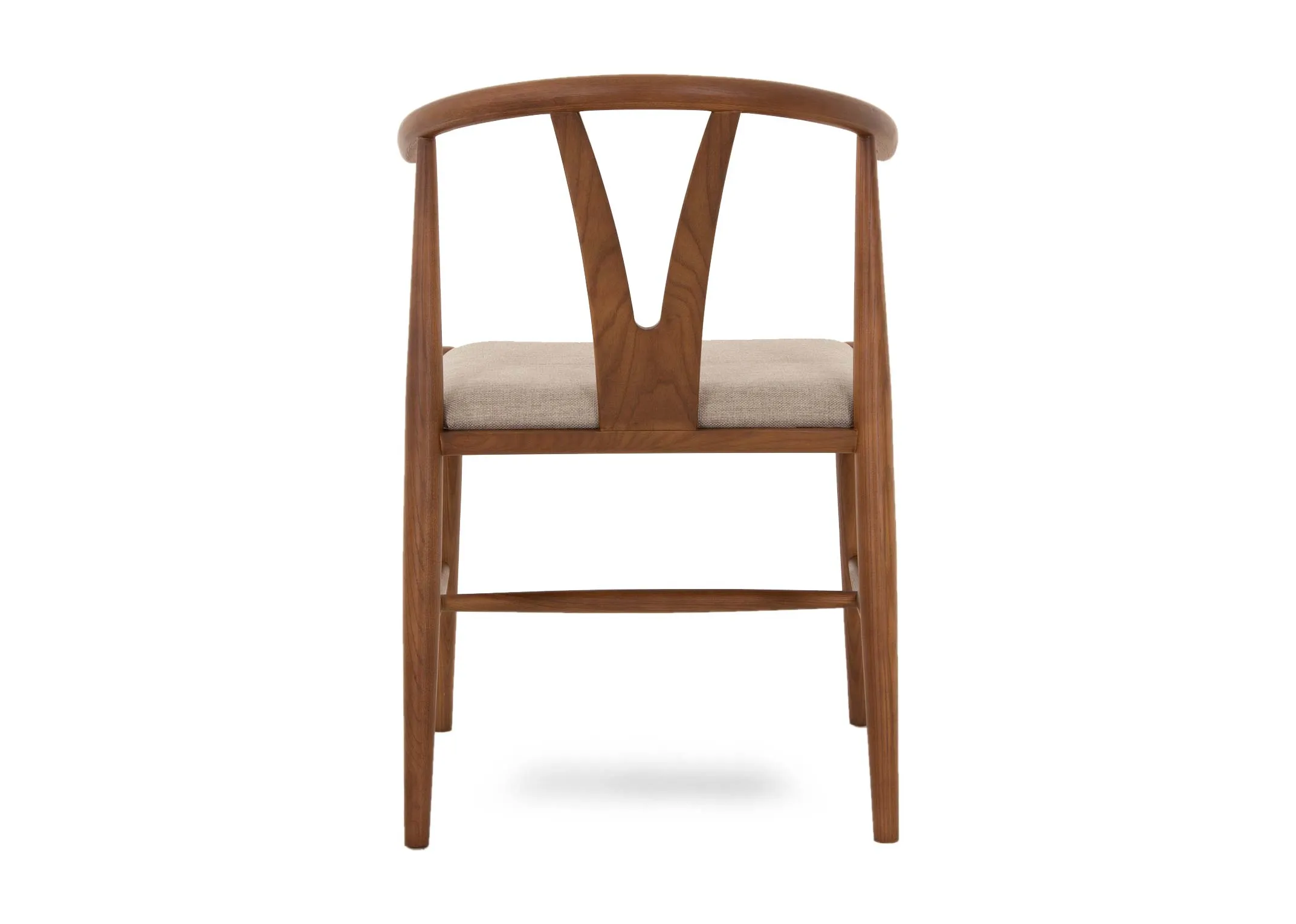 A wishbone dining chair with walnut frame from EZ Livings Cape range. Back view of wishbone shape in the seat back