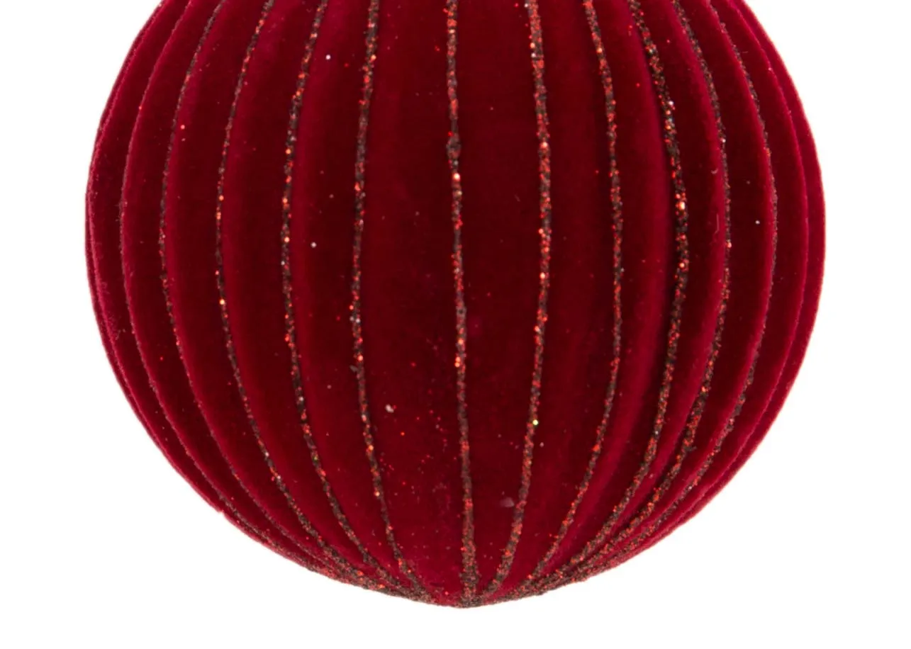 A red velvet bauble with gold ribbed trim from EZ Livings Christmas range. Closeup of glitter gold trim