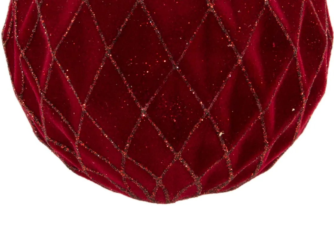 A red velvet bauble with gold lattice trim from EZ Livings Christmas range. Closeup of glitter detail