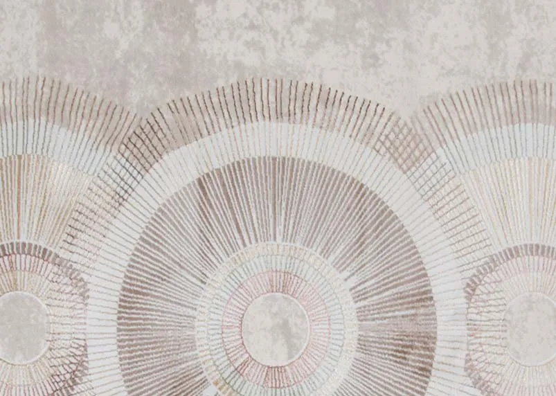 A grey & gold circular design rug from EZ Livings Create Range. Closeup of design