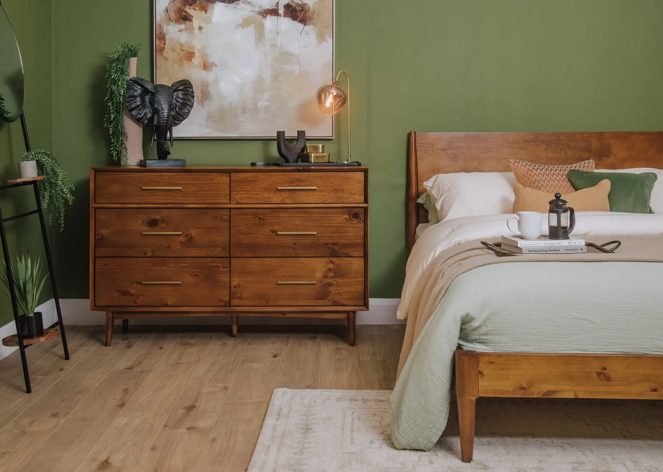 A lifestyle image of the Leya Dresser with elephant figurine
