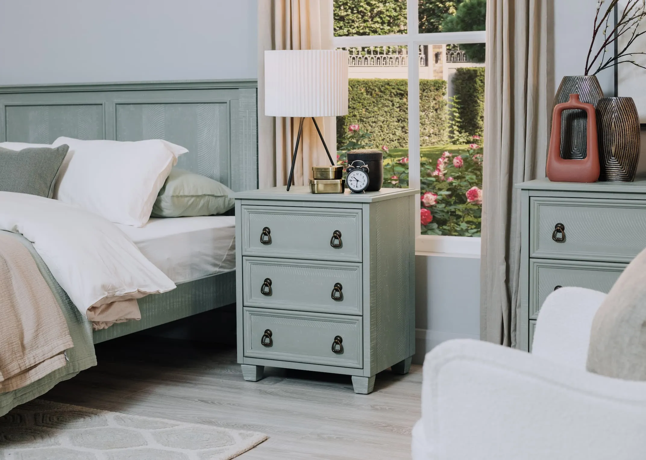A lifestyle image of the Starlette table lmap on the Grenoble side locker with matching bedframe and chest.