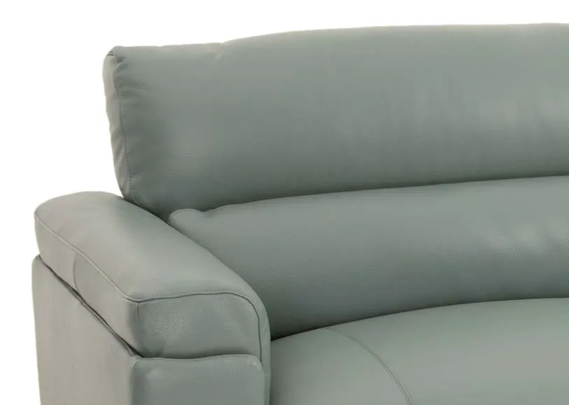 A petrol blue leather 3 seater from EZ Livings Lagoon range. Closeup of leather finish