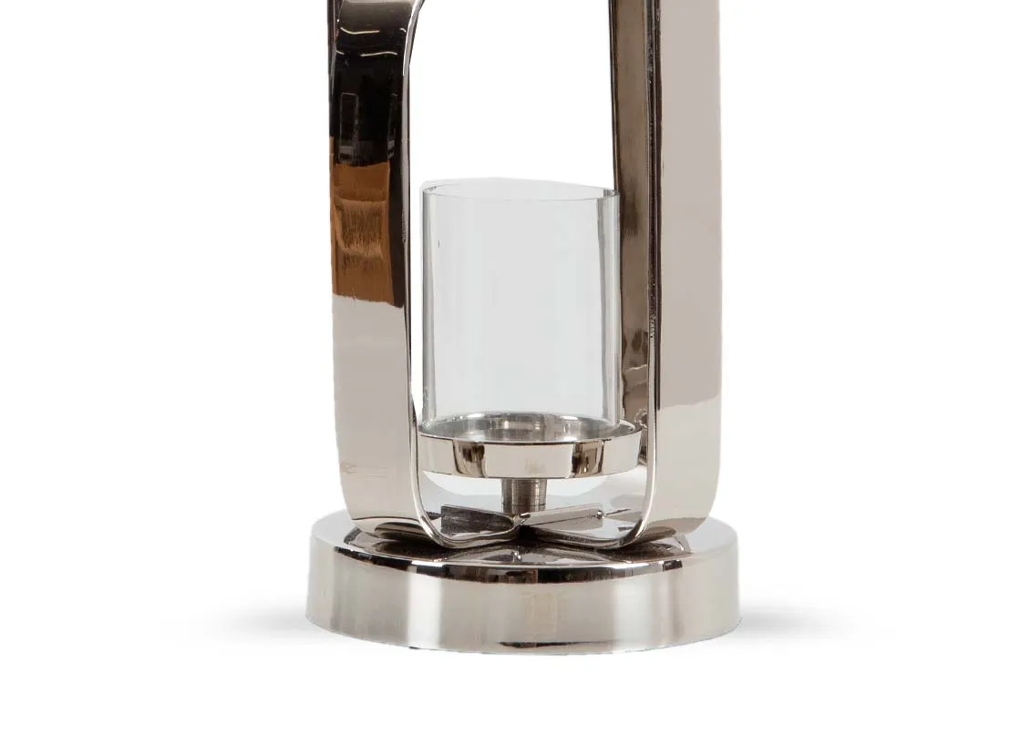 A silver metal lantern with glass cylinder for candle from EZ Livings Hurricane range.