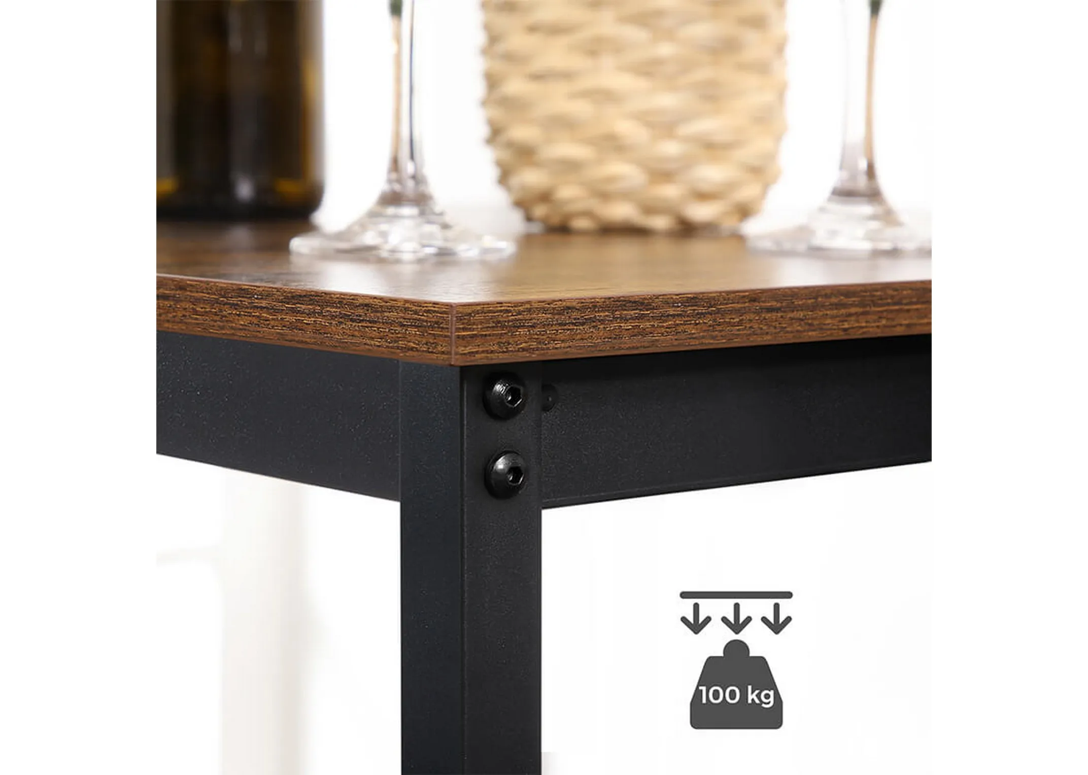 A lifestyle image of the metal frame on table with maximum weight as 100kg