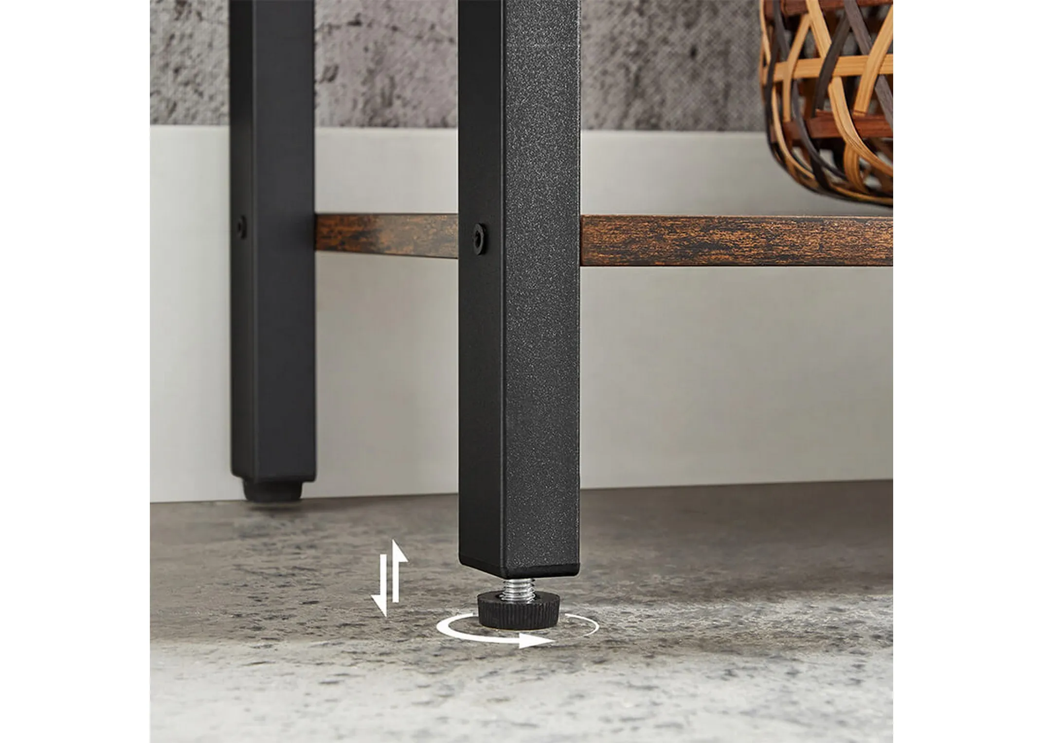 A black framed stand with 2 duplicate wood shelf units on either side of a 4 tier display unit from EZ Livings Bourbon range. Closeup of adjustable feet on frame