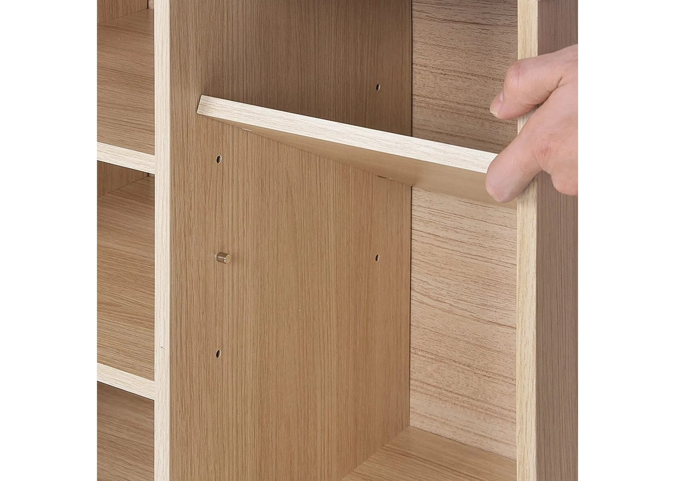  books and plants in use as a living or bedroom tidy