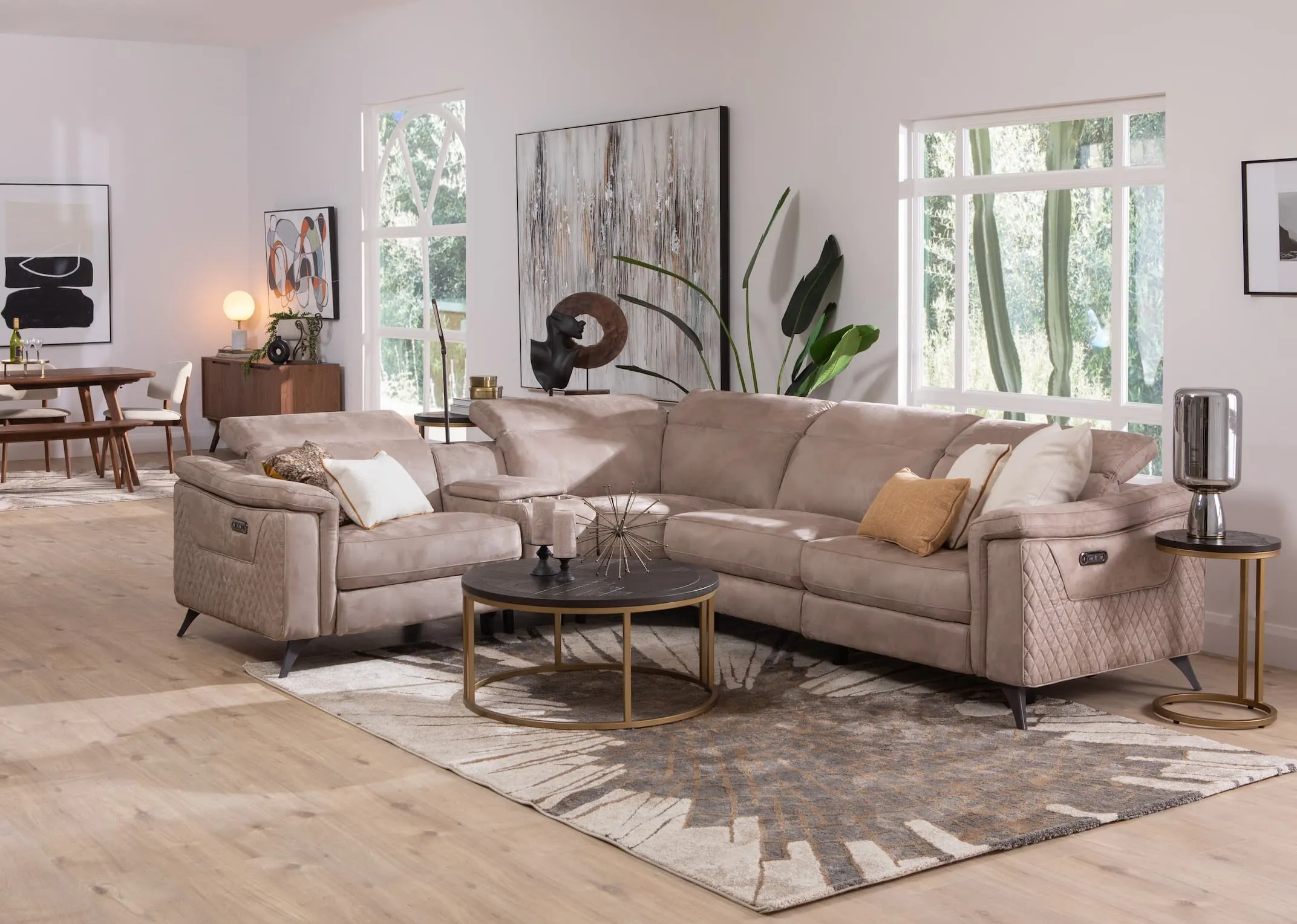 A lifestyle image of the Bellissimo LHF sofa with pasha rug and chevron coffee & lamp table with lotta lamp on it.