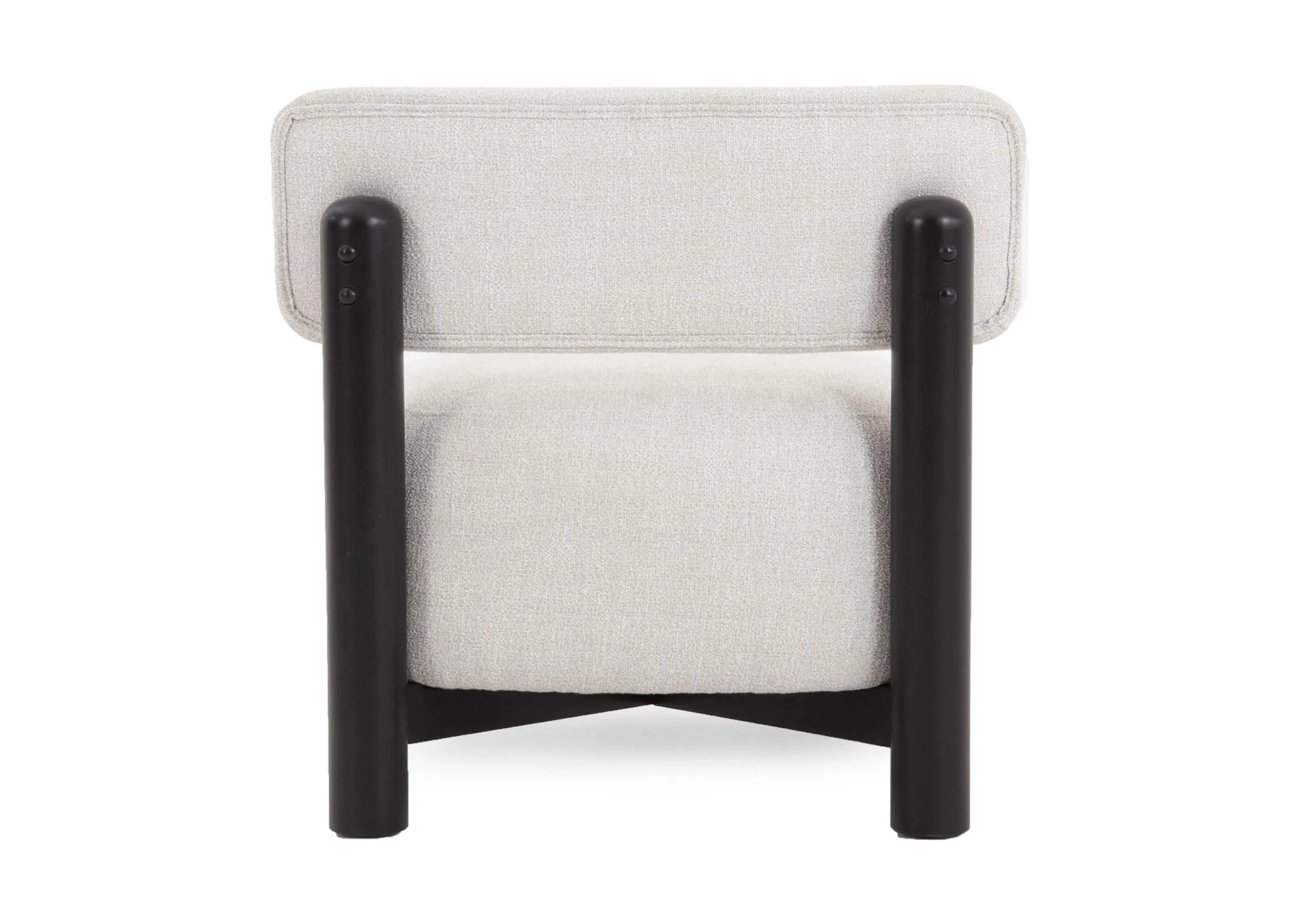 A cream fabric accent chair from EZ Livings Ember range. Side view of deep cushions and low to the ground feet.