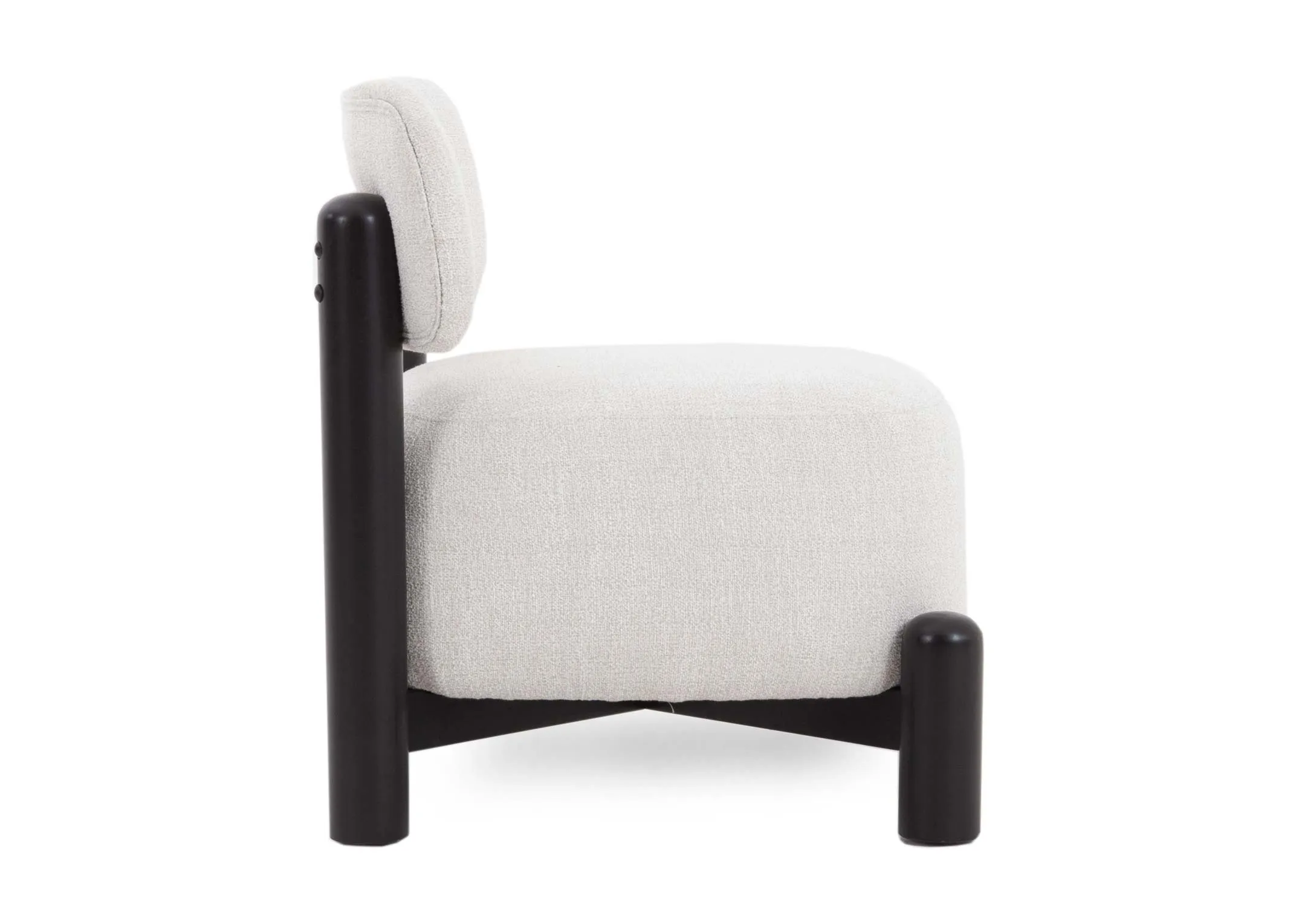 A cream fabric accent chair from EZ Livings Ember range. Side view of deep cushions and low to the ground feet.