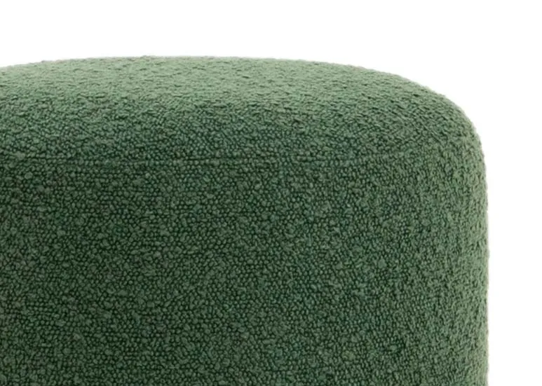 A green boucle fabric footstool from EZ Livings Parker range. Closeup of boucle fabric