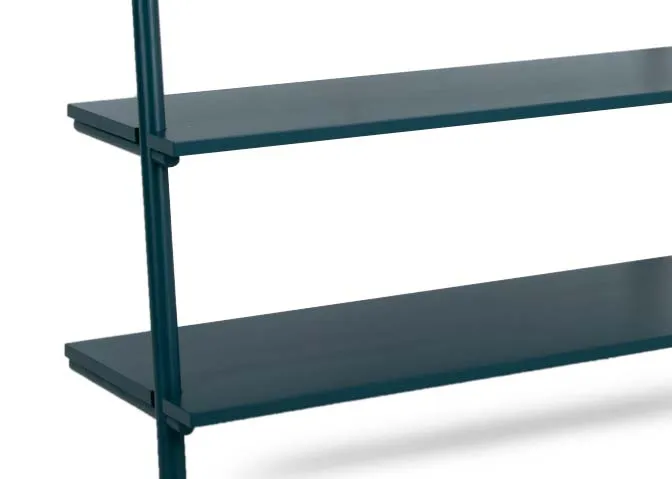 A large teal painted bookcase from EZ Livings Step range. Closeup of painted open shelves.