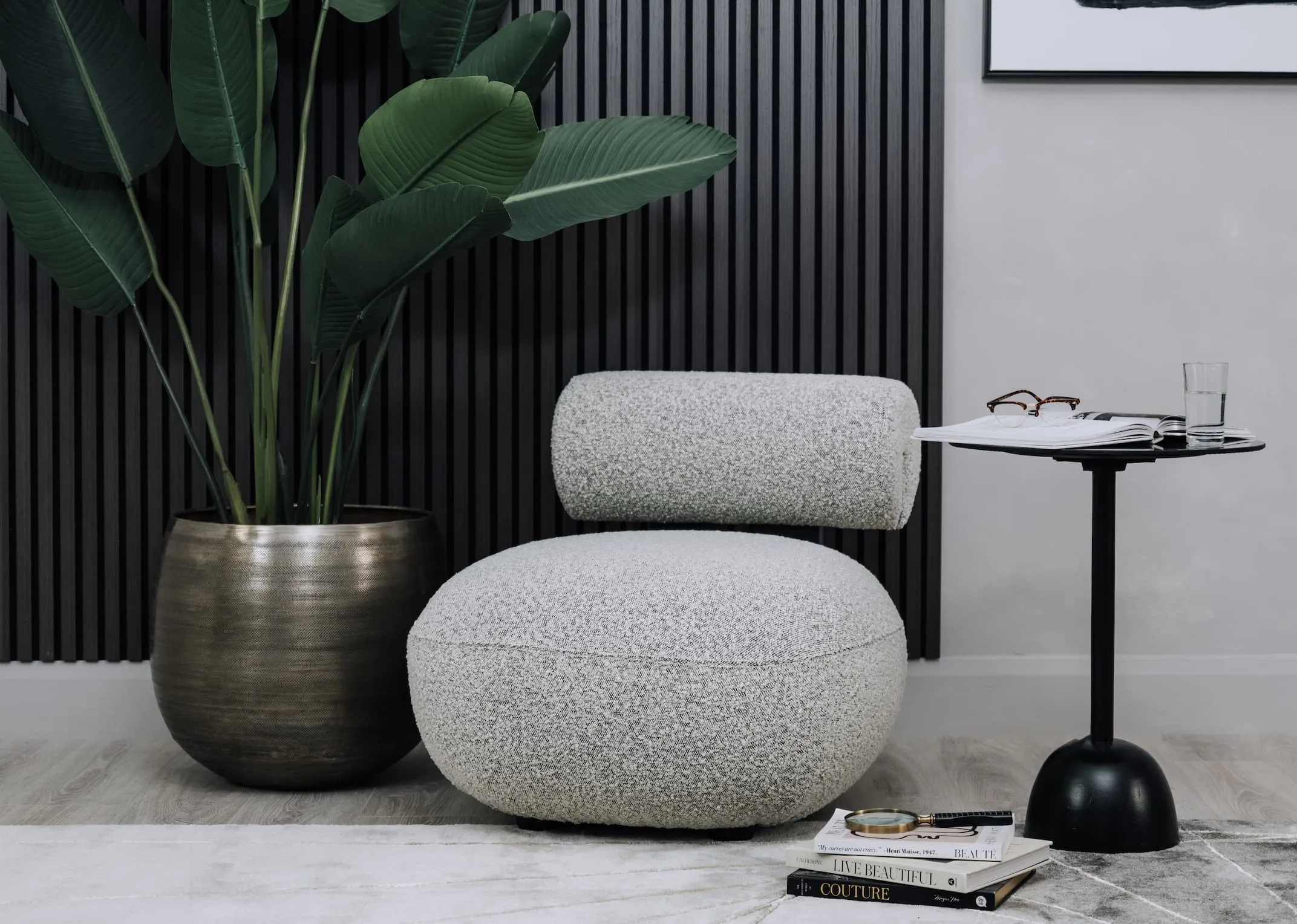 A lifestyle image of the Mollie Chair with Amelia side table.