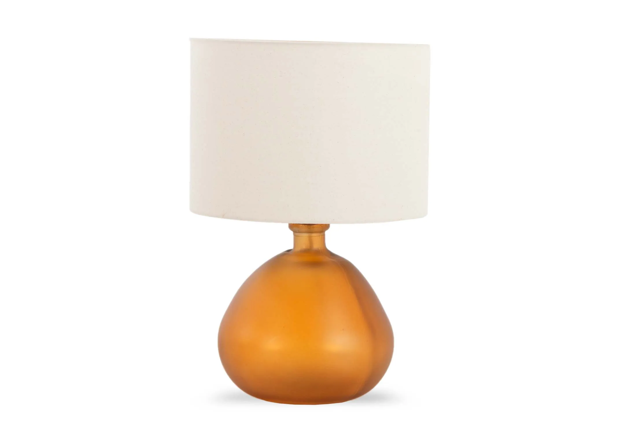 A round orange glass table lamp with off white shade fro EZ livings Alabama range. Front view