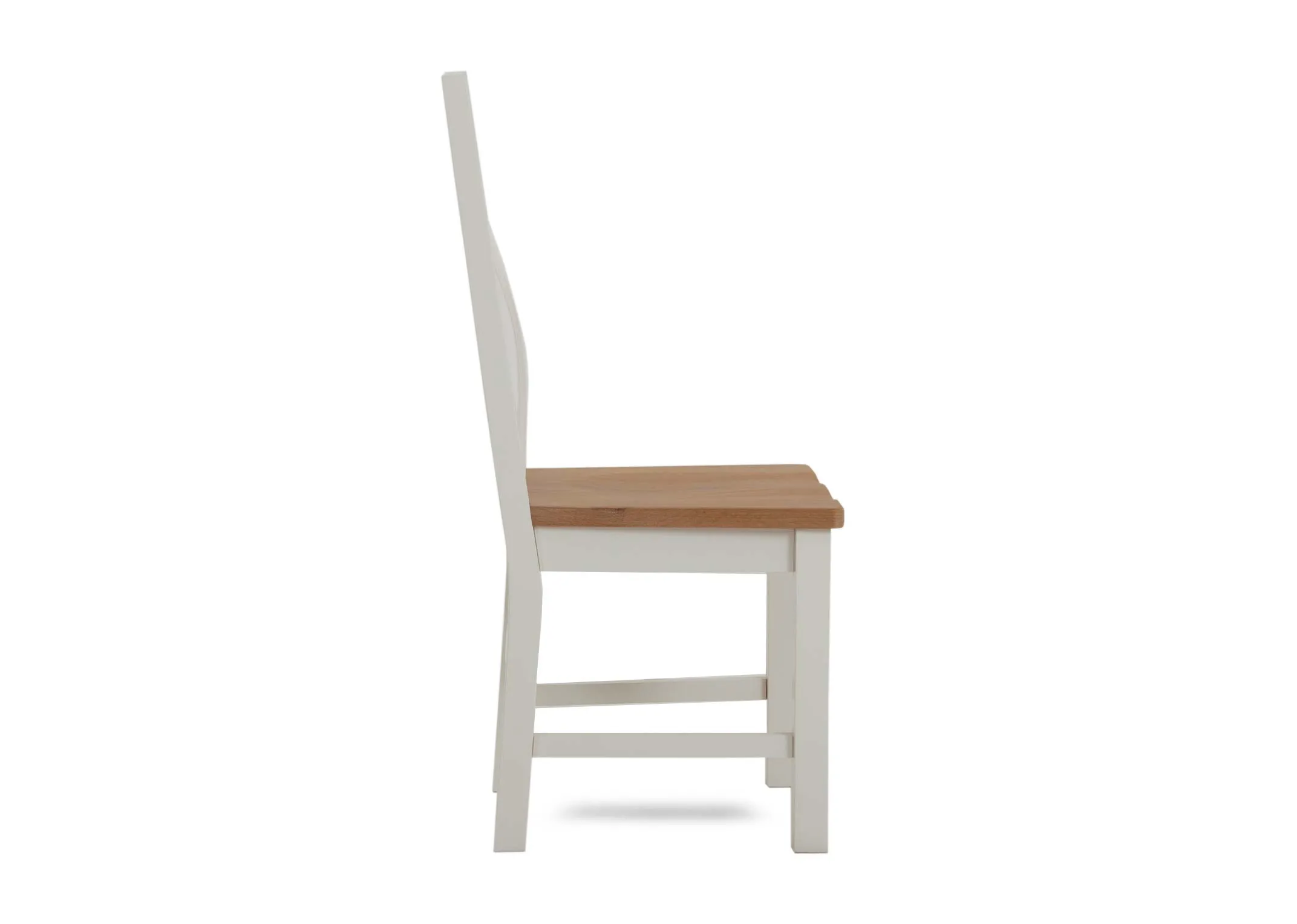 A lifestyle image of the Barleycove wooden chair with dining table and sideboard.