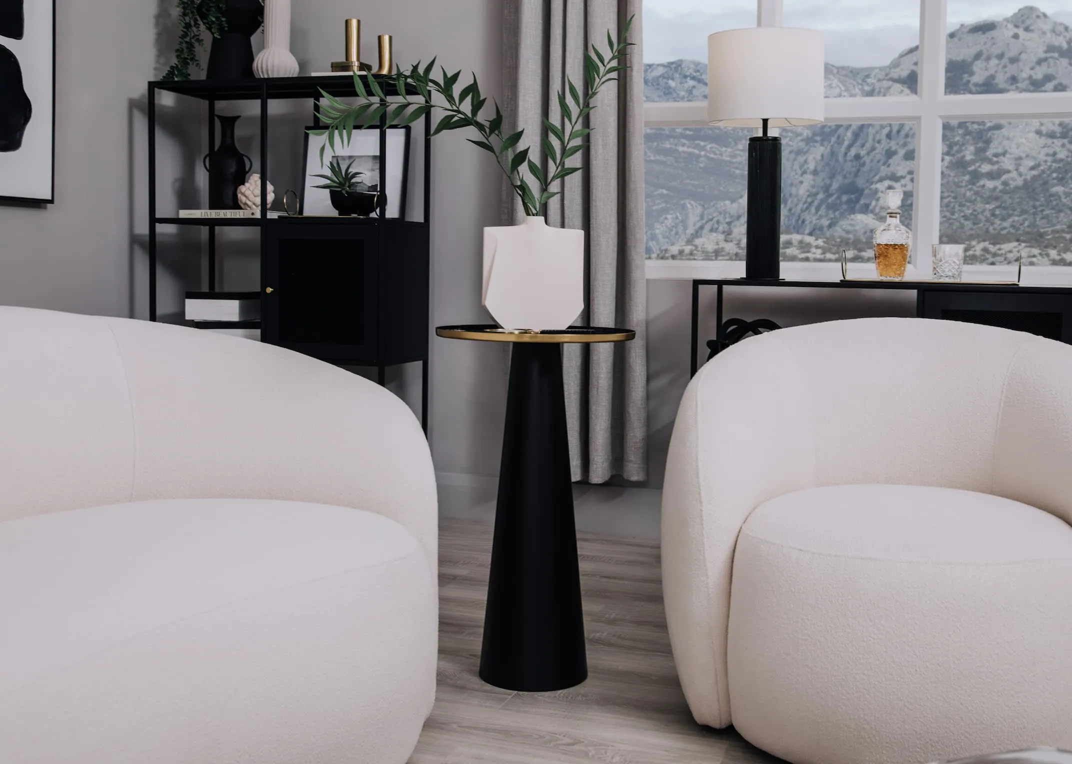A lifestyle image of the Florance sofa with amalia table with Mahaka Vase.