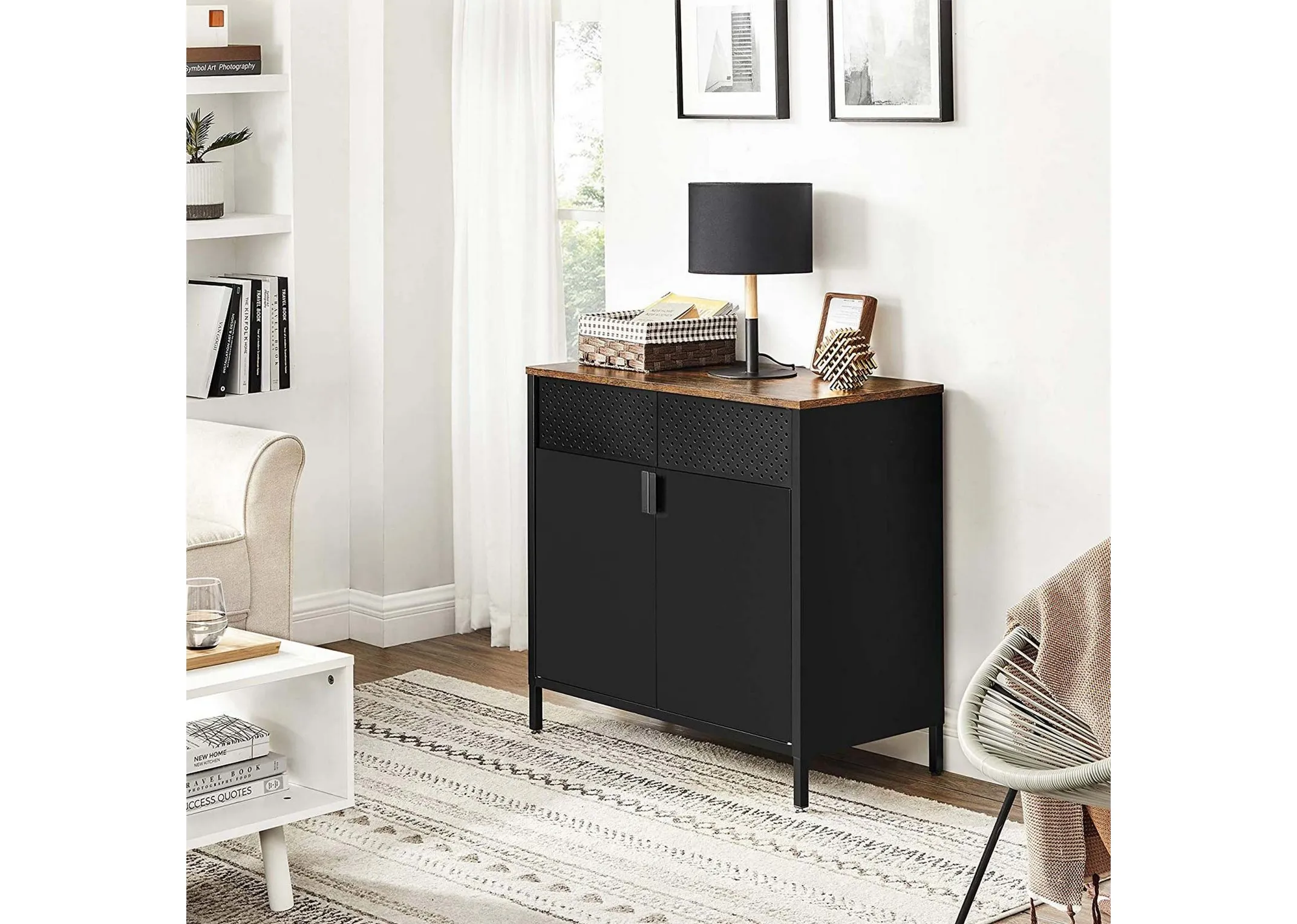 A lifestyle image of the Walter sideboard in a living space with table lamp and photo frame on top