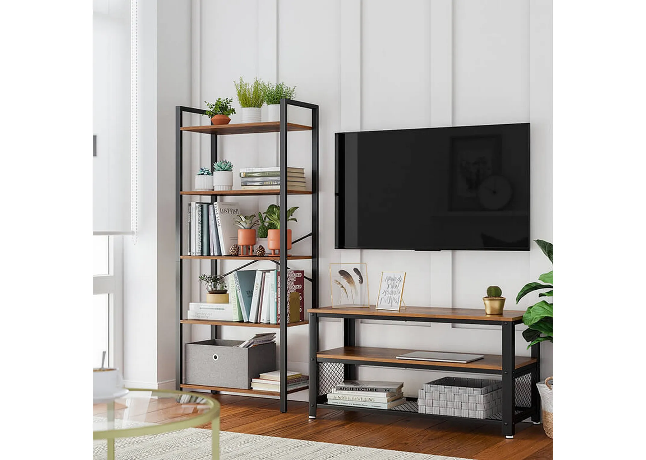 A lifestyle image of the Spectre bookcase within a living room setting with plants and books beside a tv with shelf beneath it.