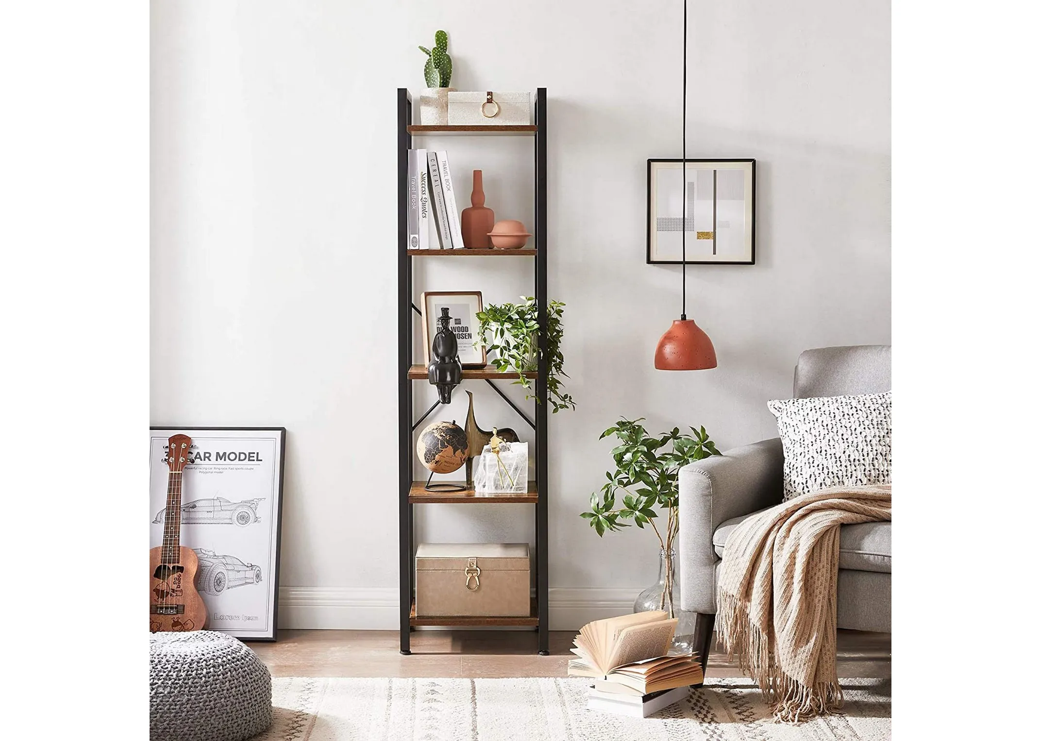 A lifestyle image of the Specter Slim bookcase filled with plants vases and photo frame.