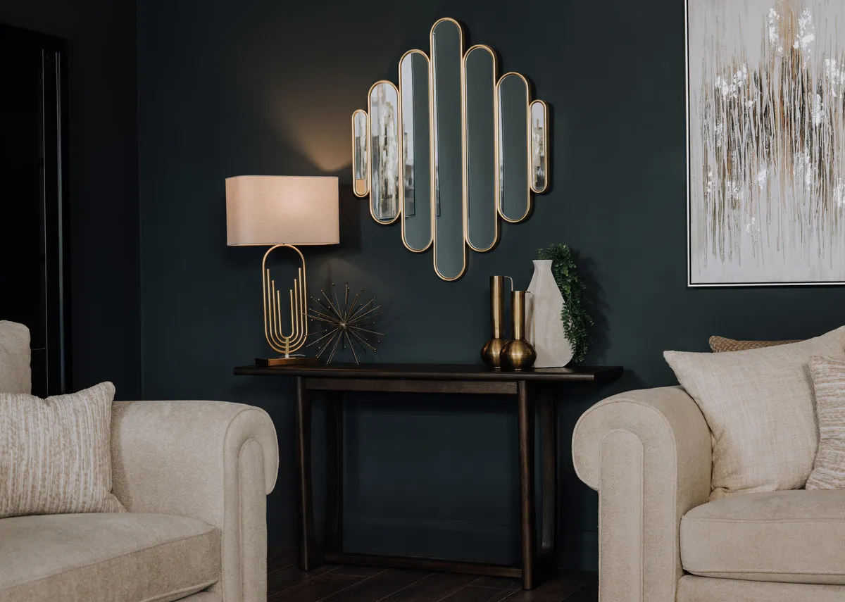 A lifetsyle image of the Flow espresso console table with Tallie Mirror and Manila lamp.