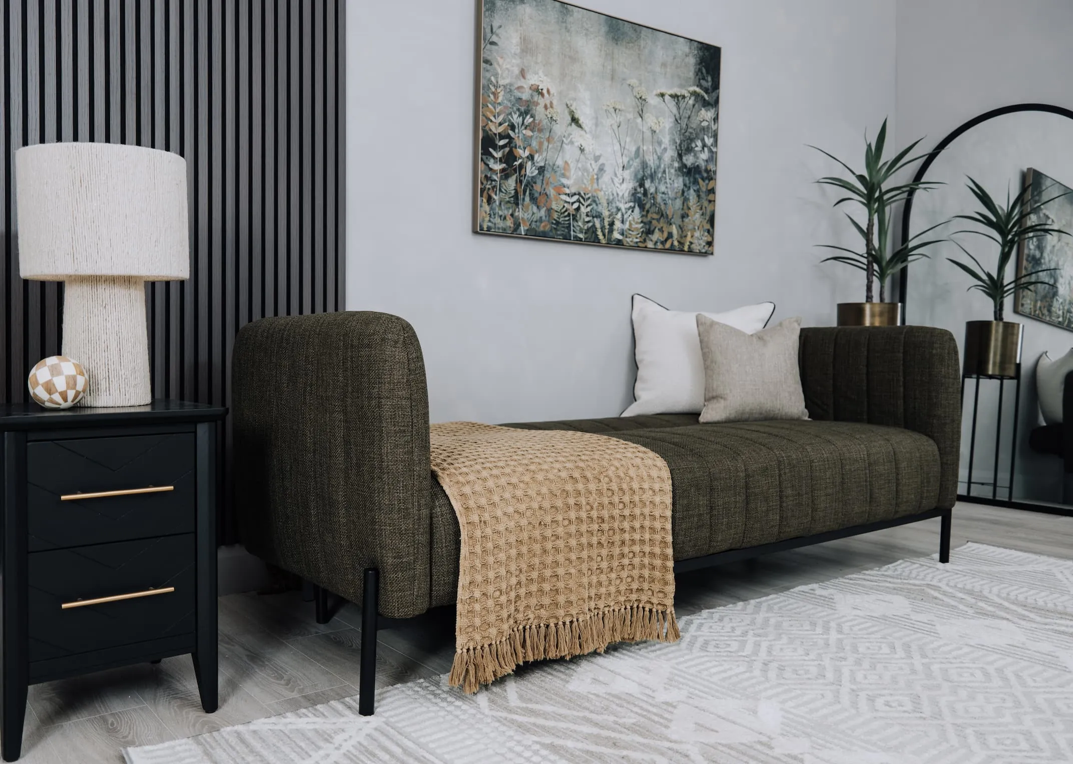 A dimension image of the Newquay sofabed with 214.5cm x 86cm x 85.5cm