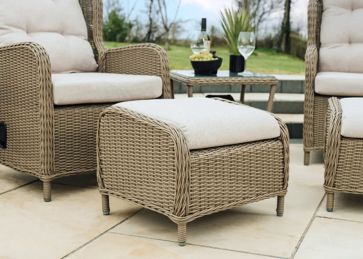 A lifestyle image of the Laurel footstool