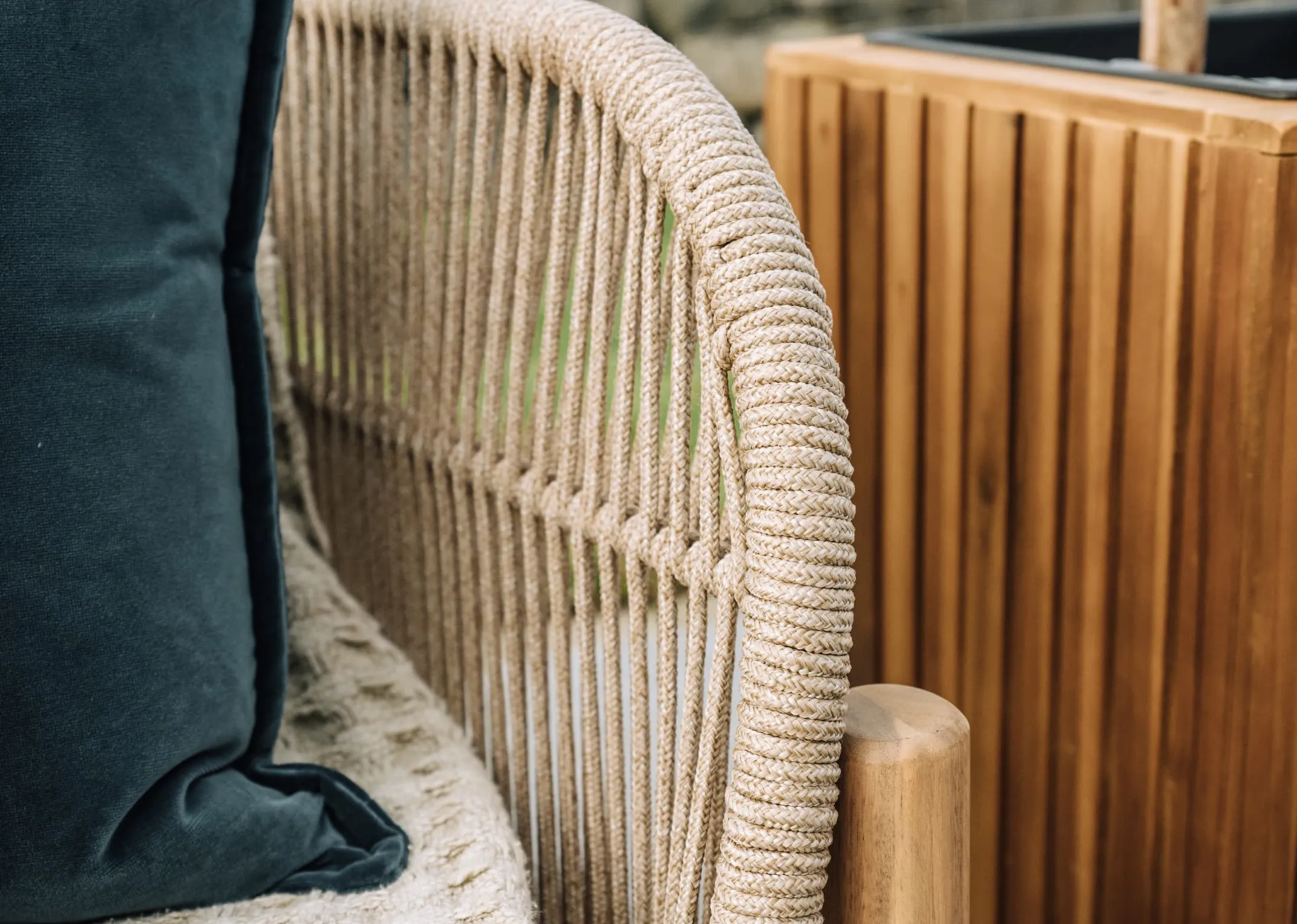 A lifestyle image of the La Palma Garden set with a closeup shot of the rope fabric on the arms of the chairs.