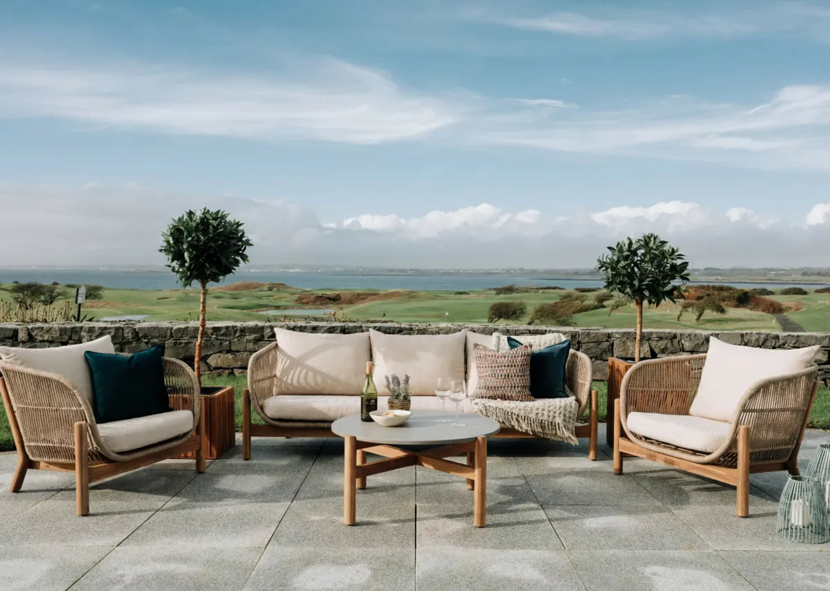 A lifestyle image of the La Palma Garden set with a closeup shot of the rope fabric on the arms of the chairs.