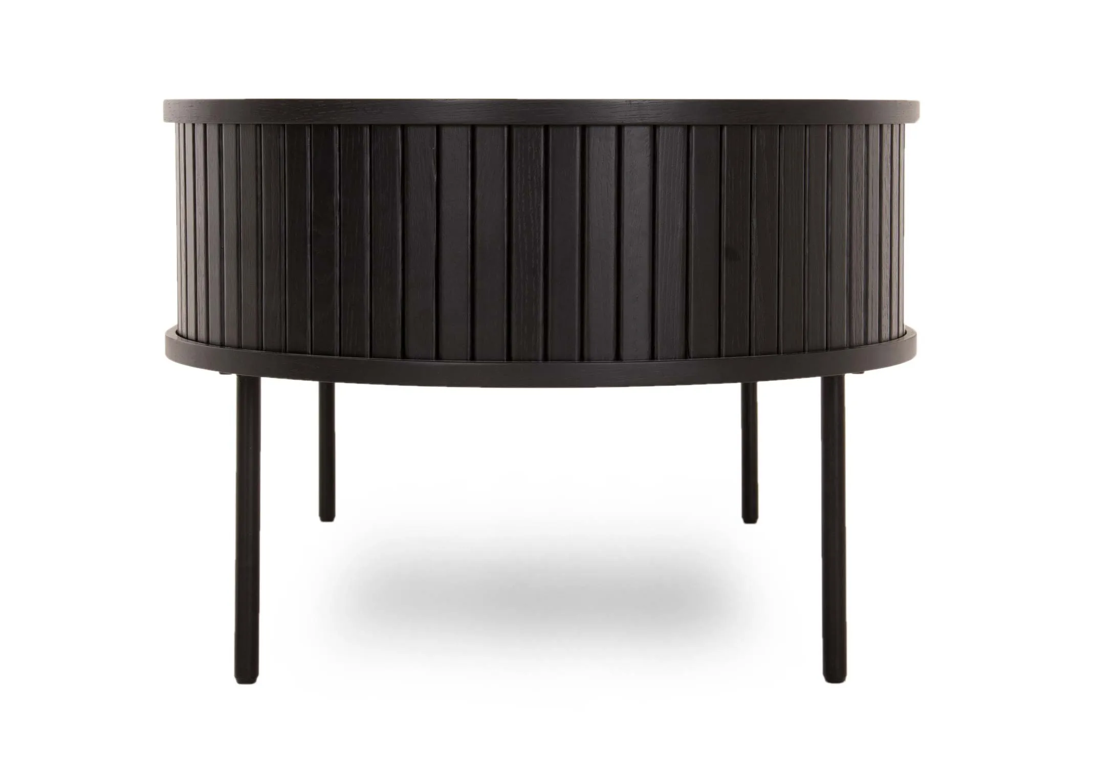 A black oak coffee table with a slatted tambour door from EZ Livings Nola range. Side view of slatted curved doors