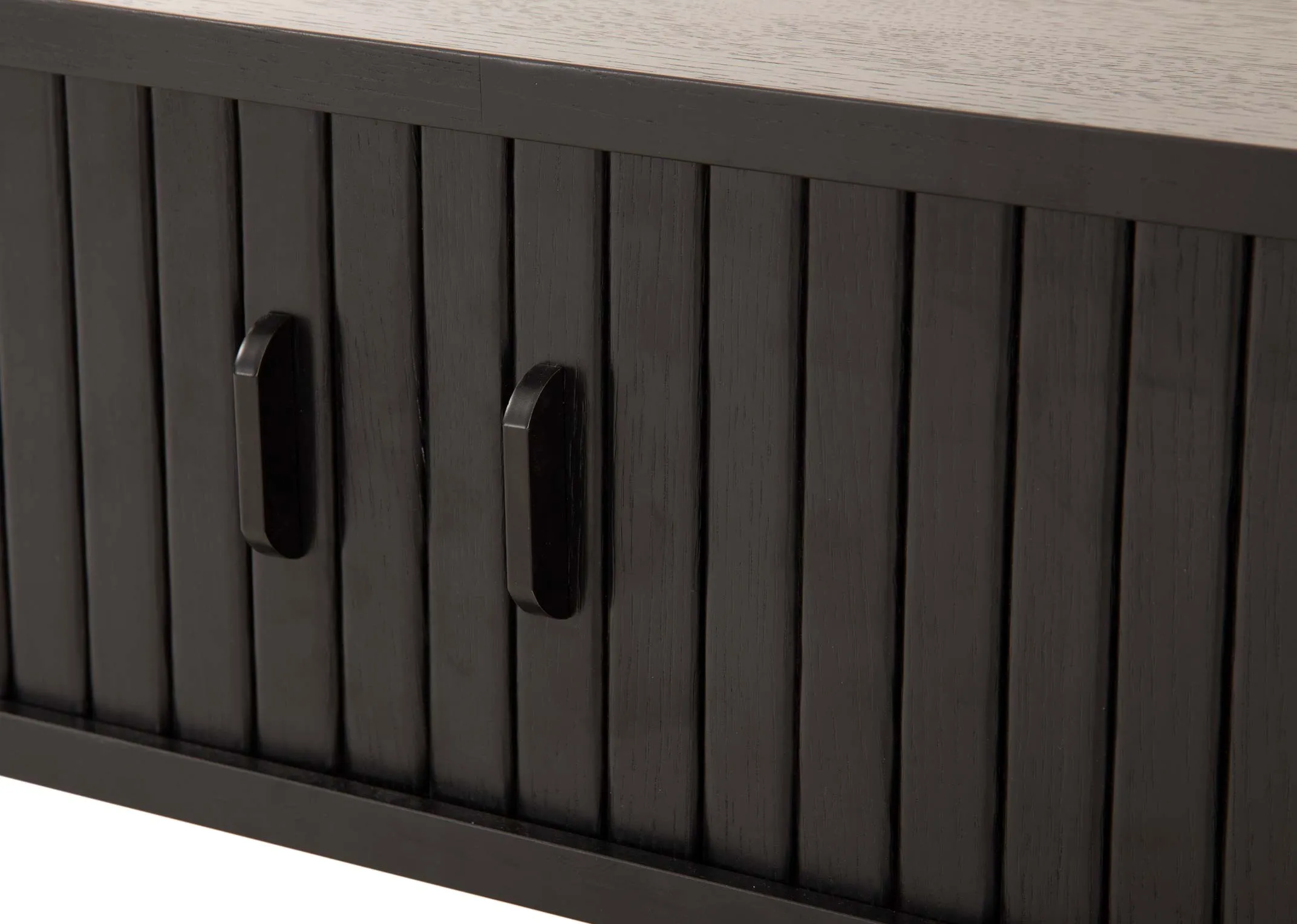 A black oak coffee table with a slatted tambour door from EZ Livings Nola range. Closeup of metal handles