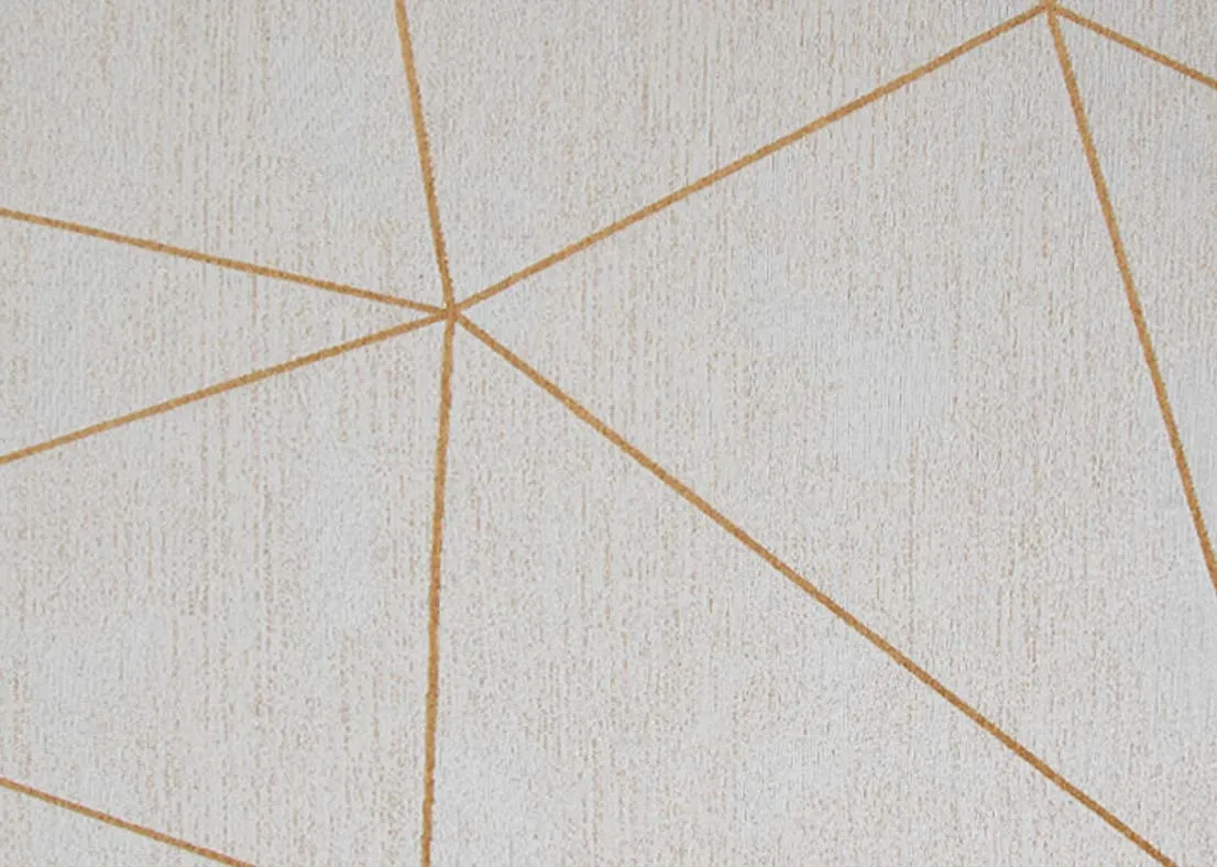 A large white rug with gold linear pattern from EZ Livings Charvi range.Closeup of gold diagnol pattern.