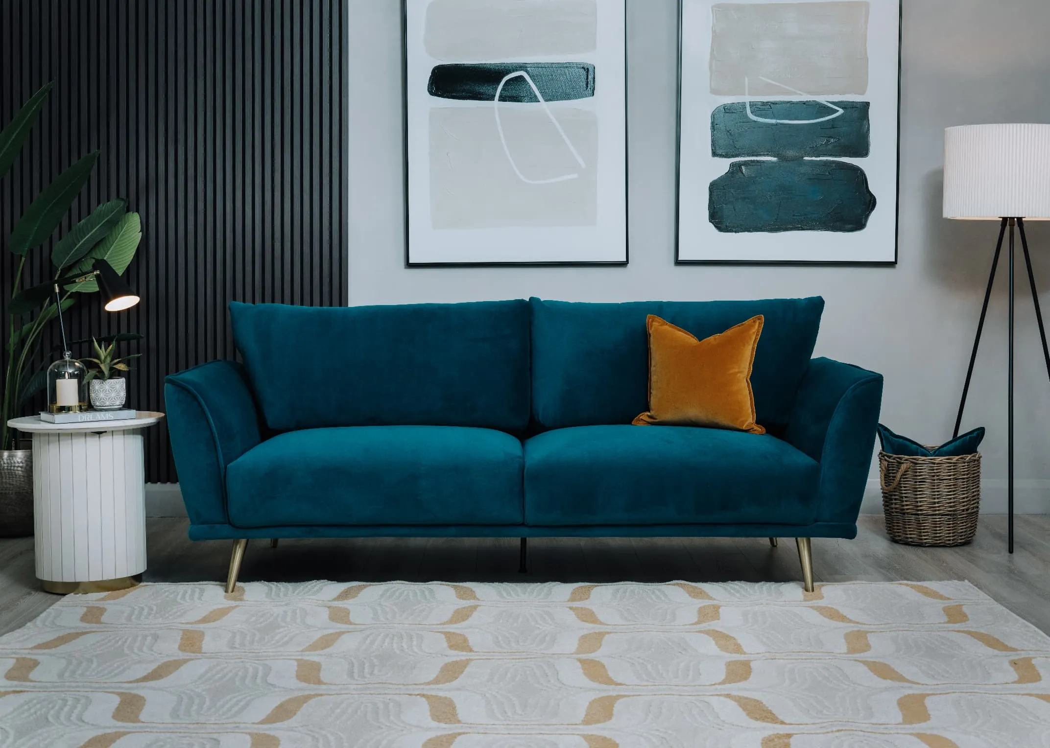 A lifestyle image of the Katie 4 Seater with Brera rug and Ketan table