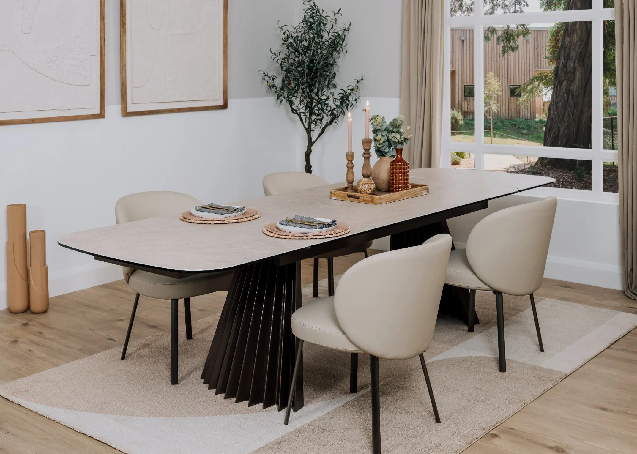 A lifetsyle image of the Fulton dining table with Lorenzo chairs and Divine rug.